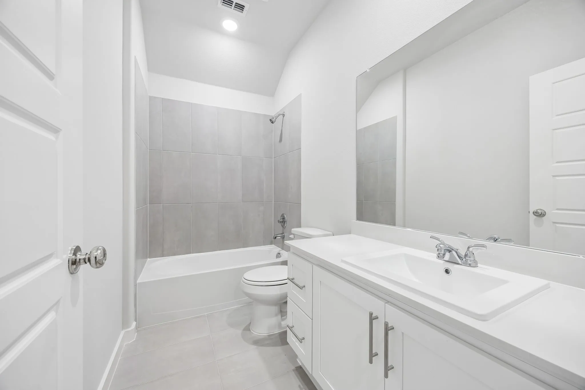 Secondary bathroom in the Heisman by Trophy Signature Homes – REPRESENTATIVE PHOTO
