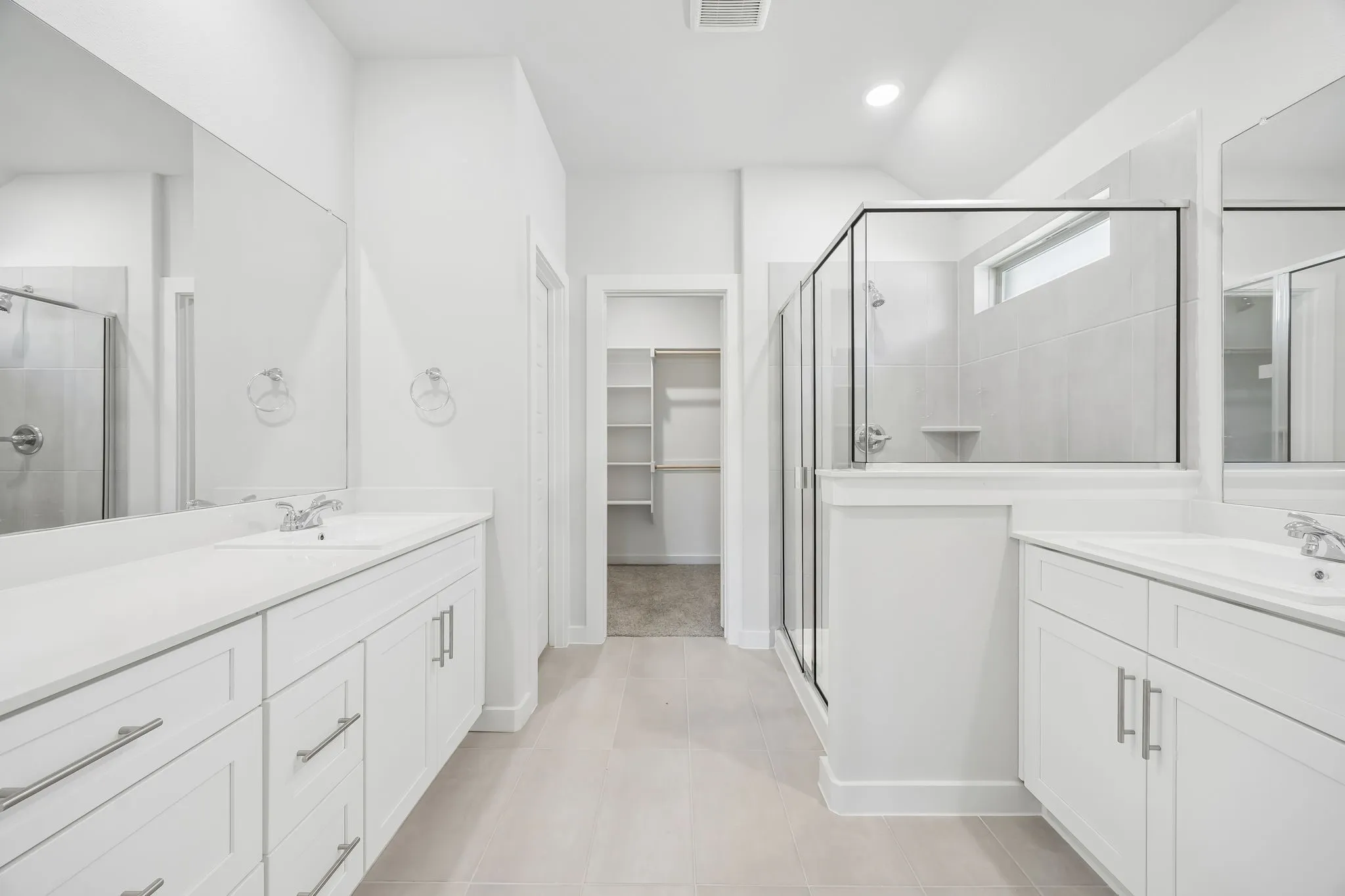 Primary bathroom in the Heisman home plan by Trophy Signature Homes – REPRESENTATIVE PHOTO