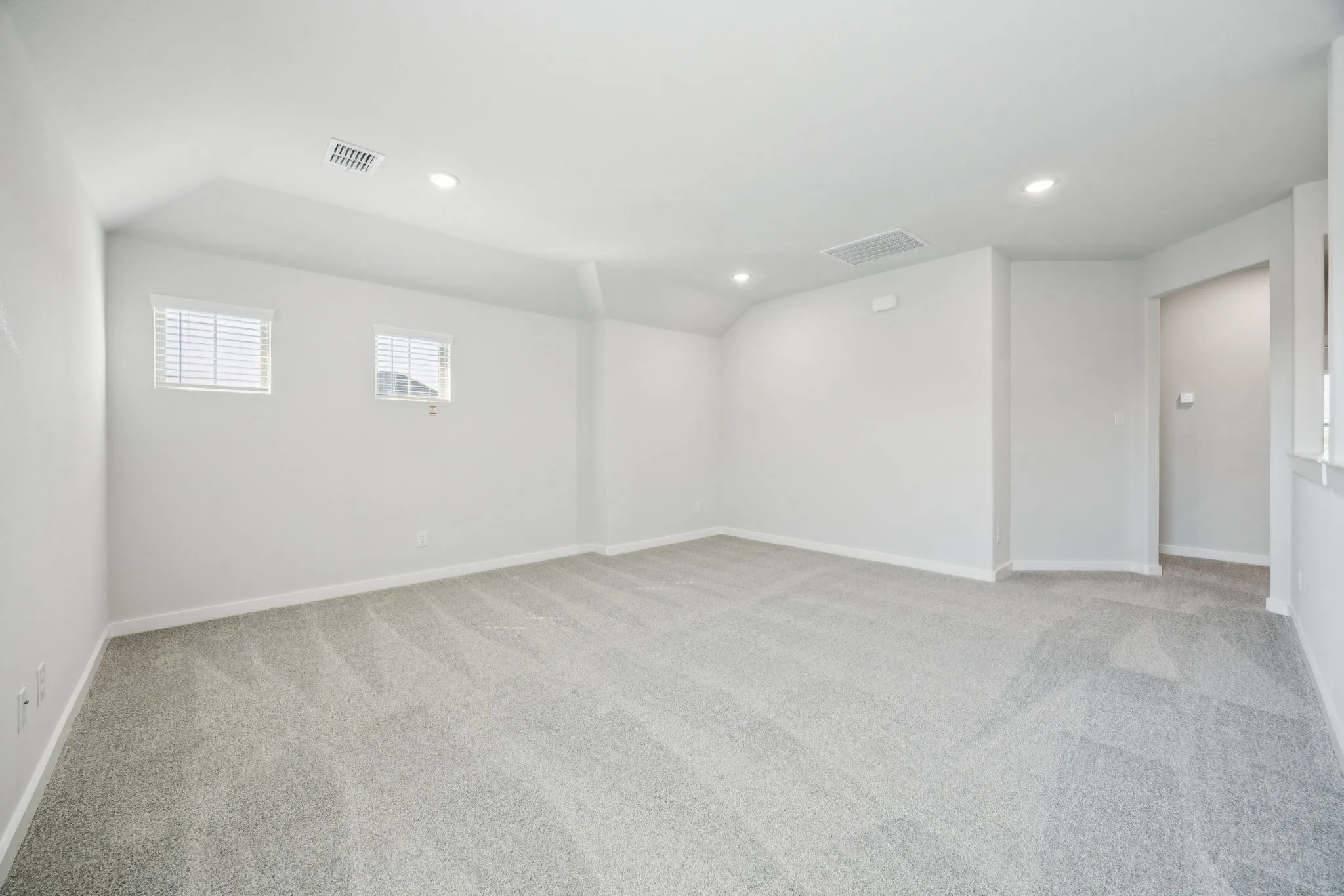 Game room in the Masters home plan by Trophy Signature Homes – REPRESENTATIVE PHOTO