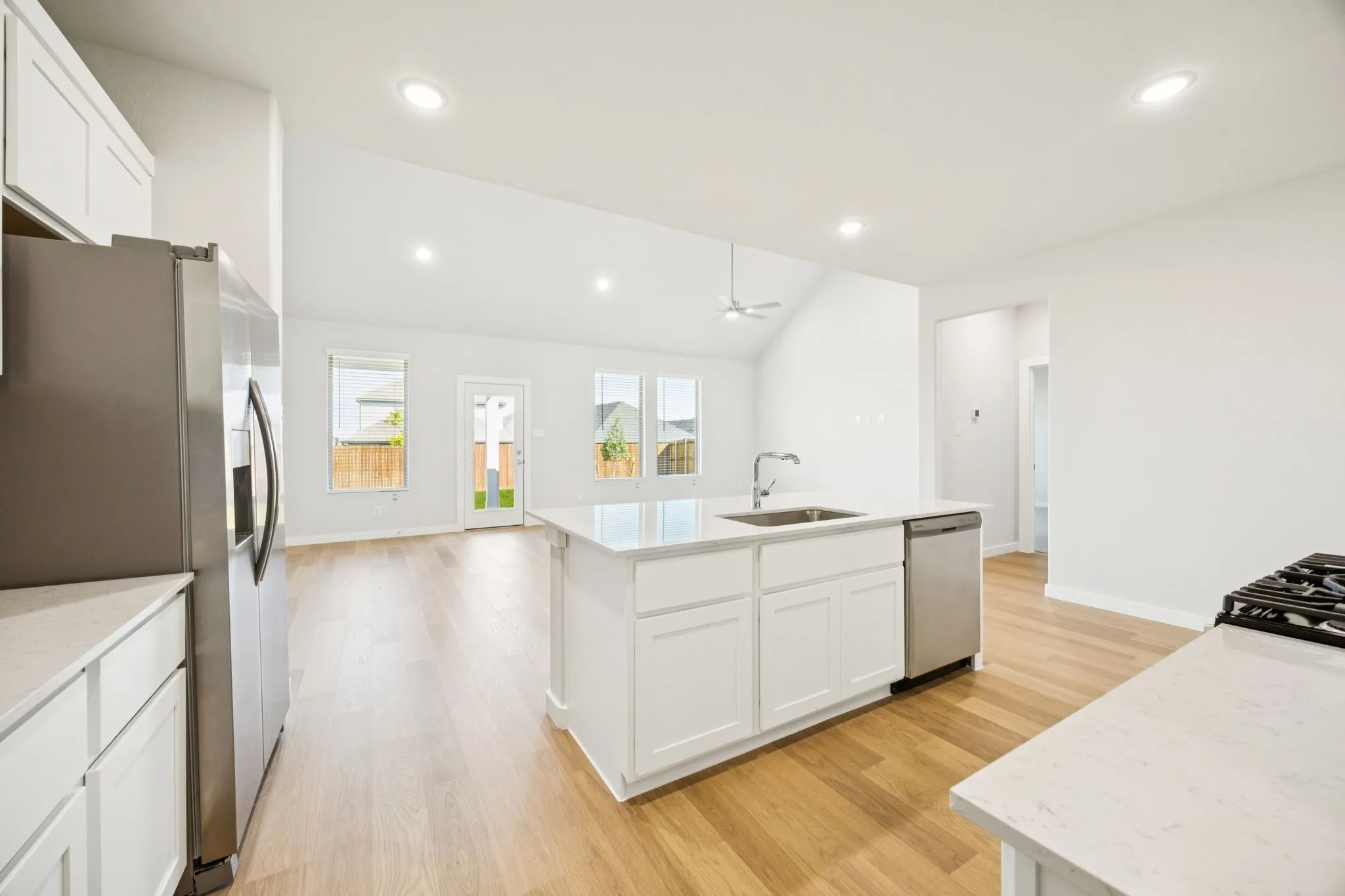 Kitchen in the Masters home plan by Trophy Signature Homes – REPRESENTATIVE PHOTO