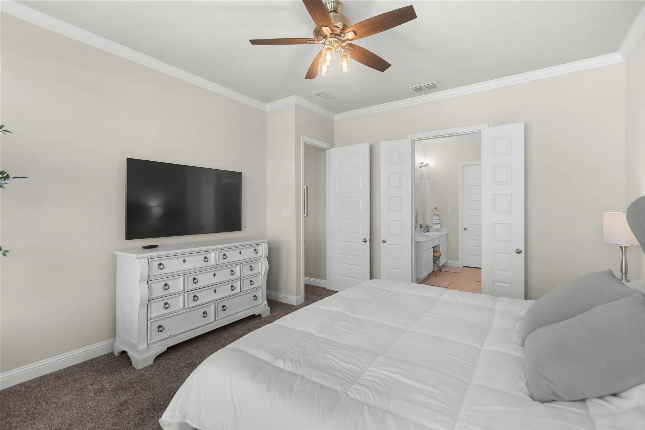 Primary bedroom with en-suite bathroom.