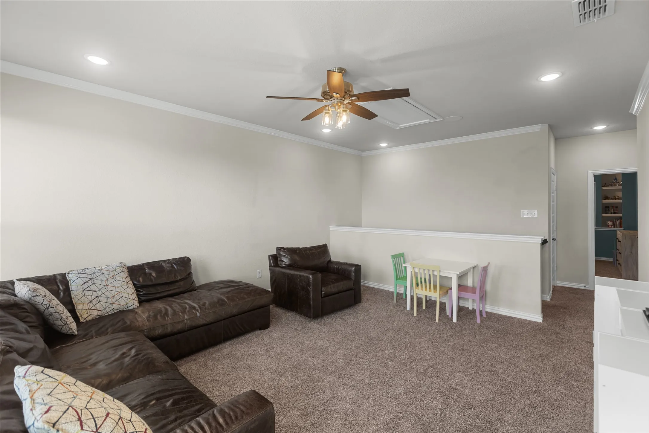 Family room located upstairs with built-in surround sound speakers to turn this room into the ultimate media space!