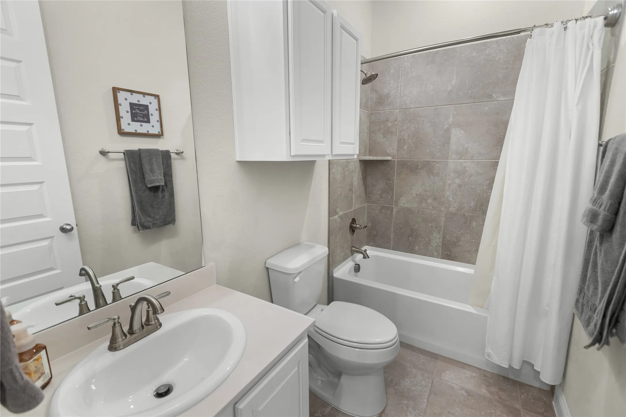 Convenient first-floor full bathroom located just off the bedroom.