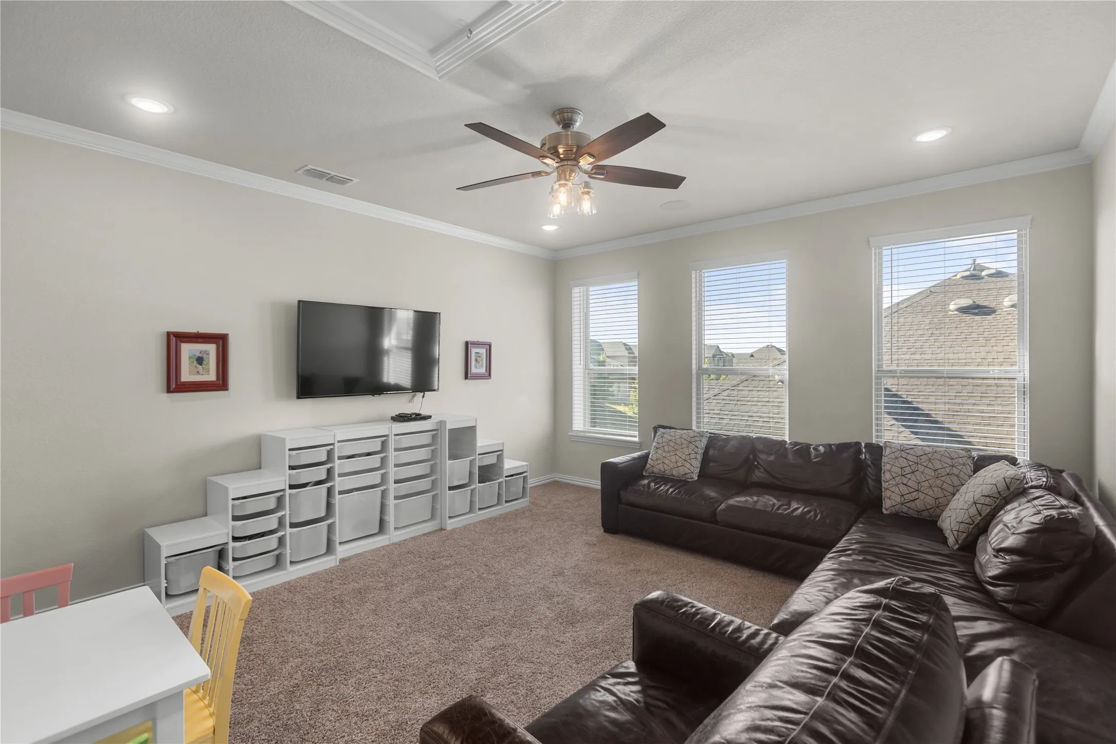 Family room located upstairs, perfect for a play room, media/movie room, or flex space!