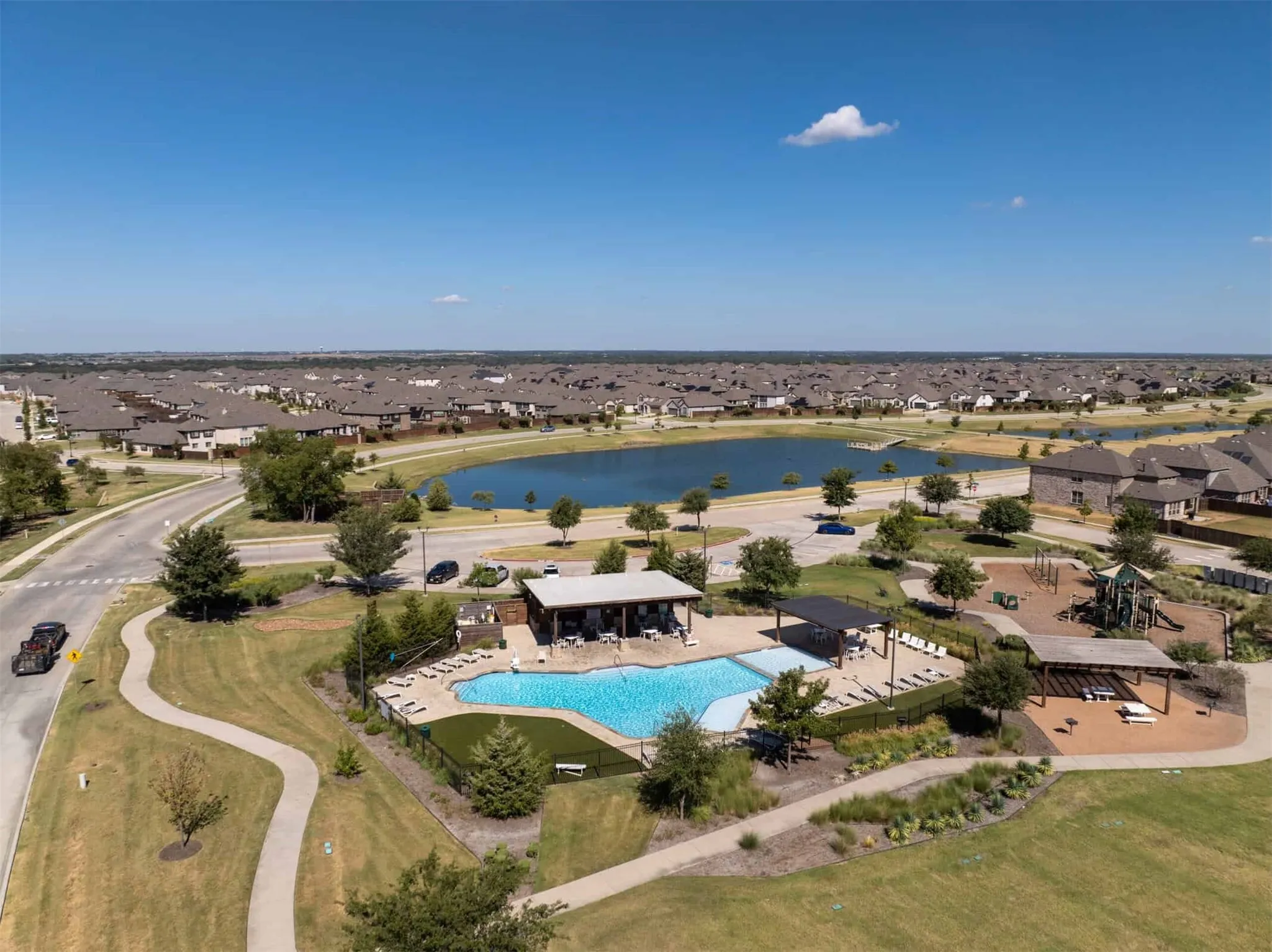 Aerial Photo of the community pool and fishing pond.