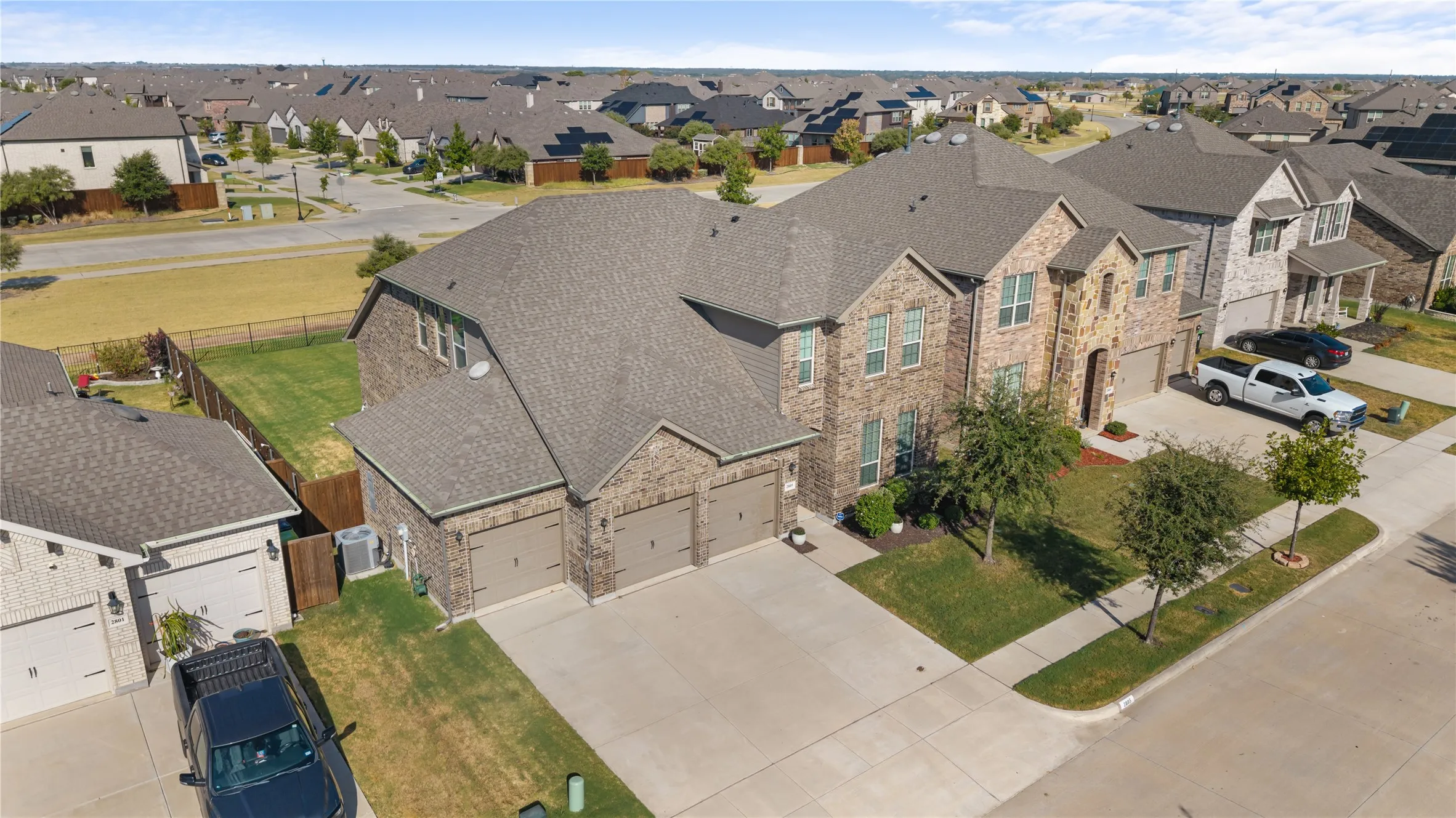 A spacious 3-car garage offers plenty of room for parking, storage, and organization.