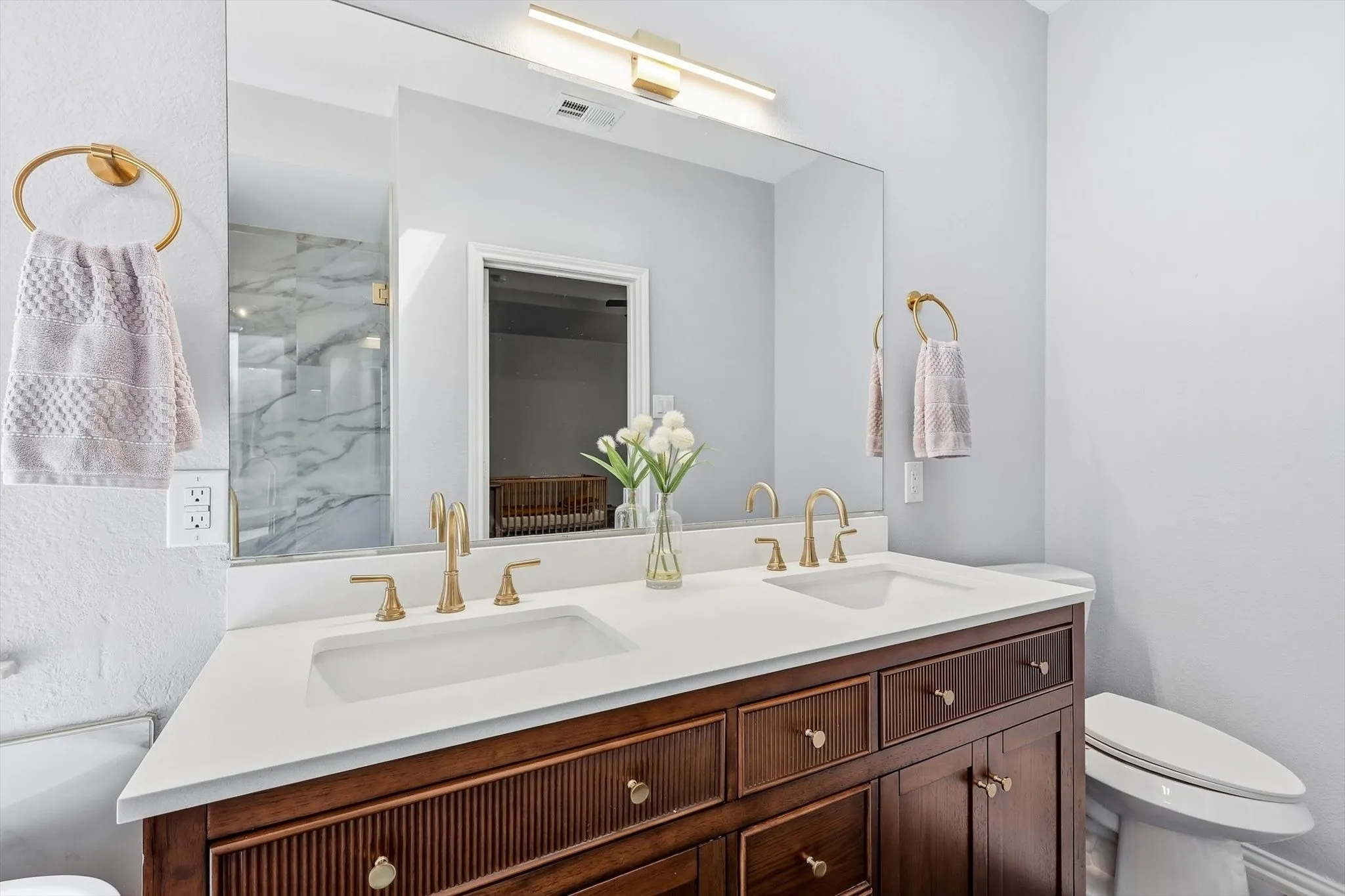 GORGEOUS UPDATED custom primary ensuite bathroom with fresh lighting and finishes