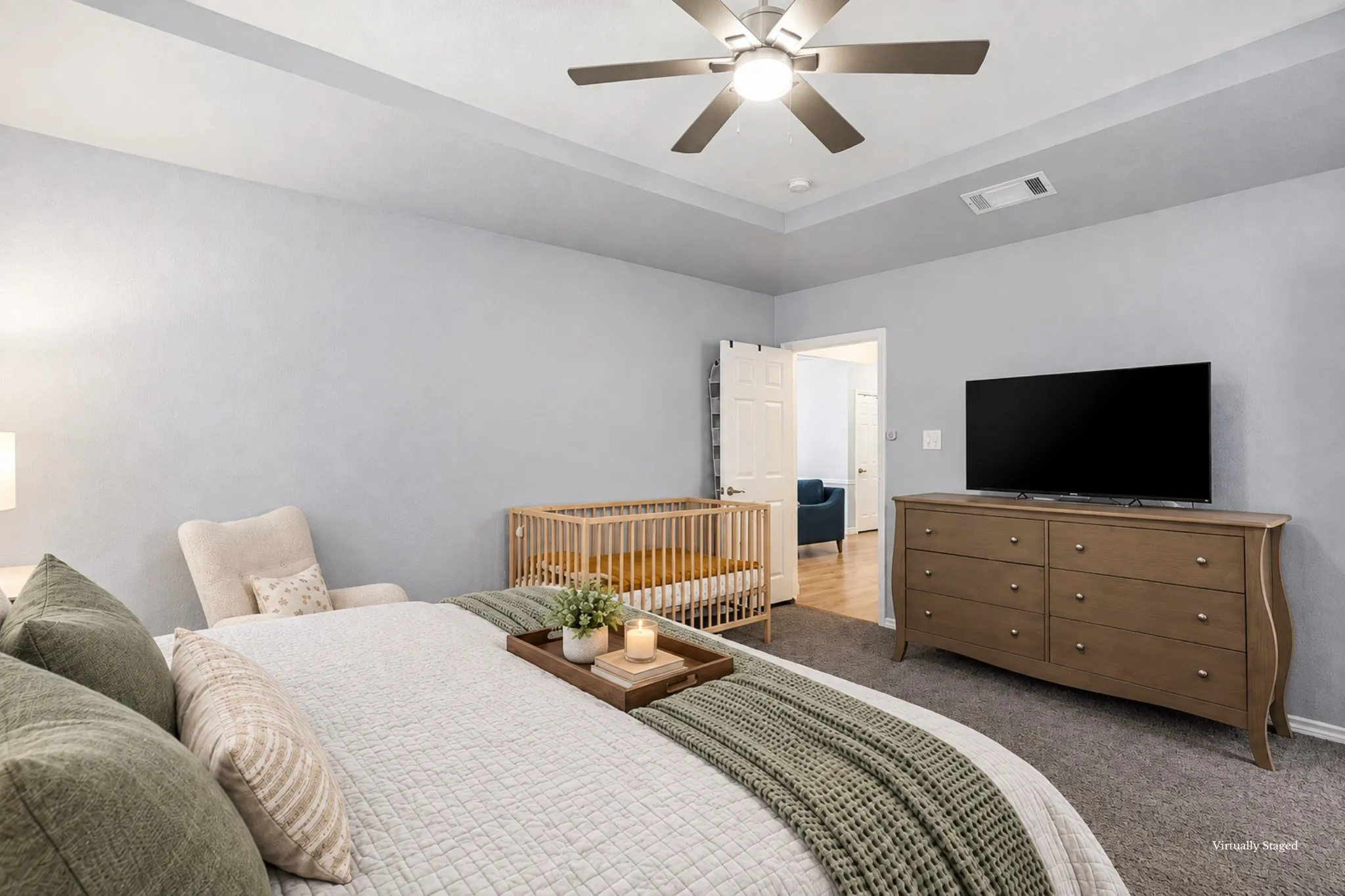 Primary suite right off the living space makes for easy access and seamless flow