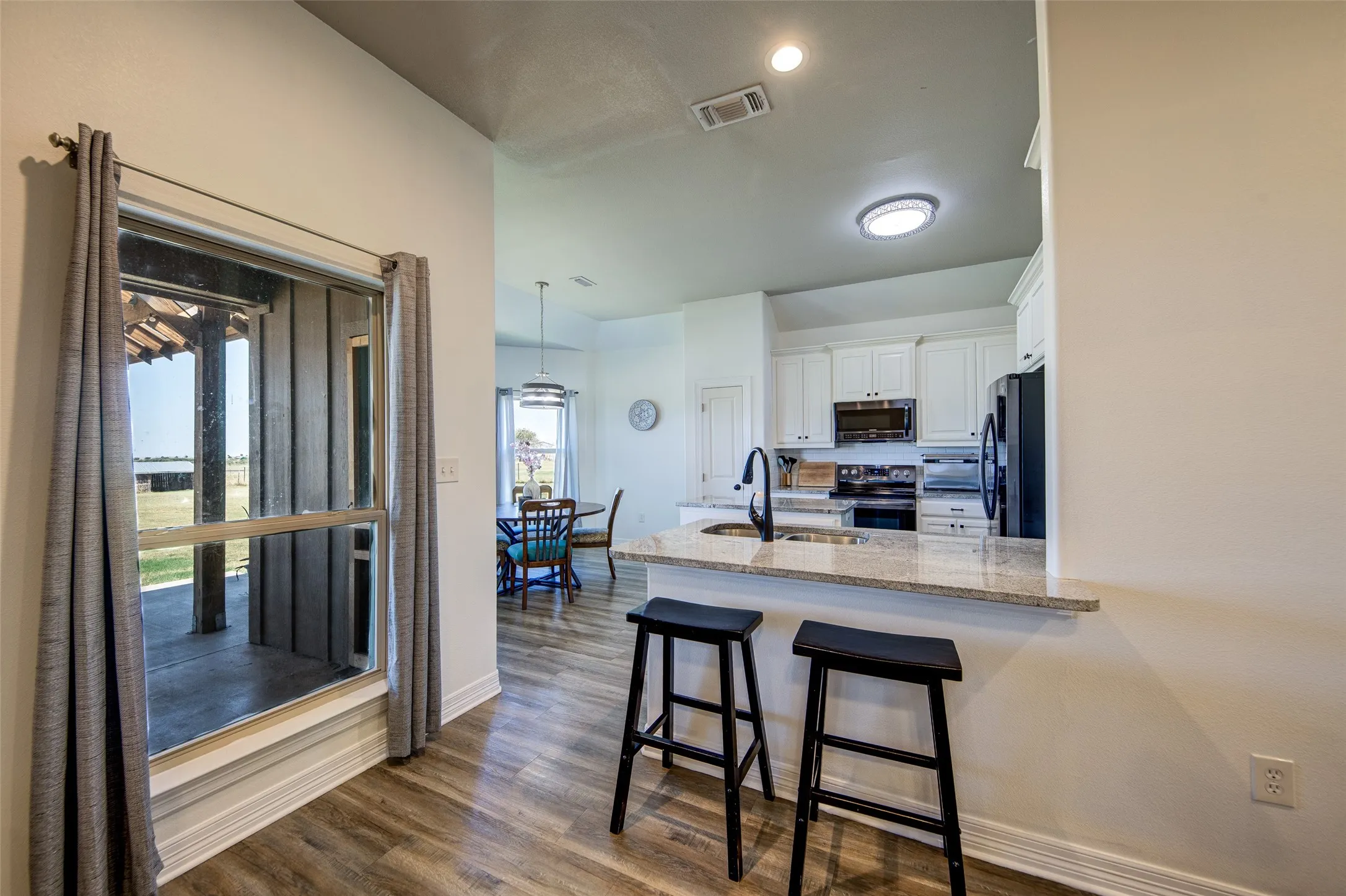 Kitchen from living room .