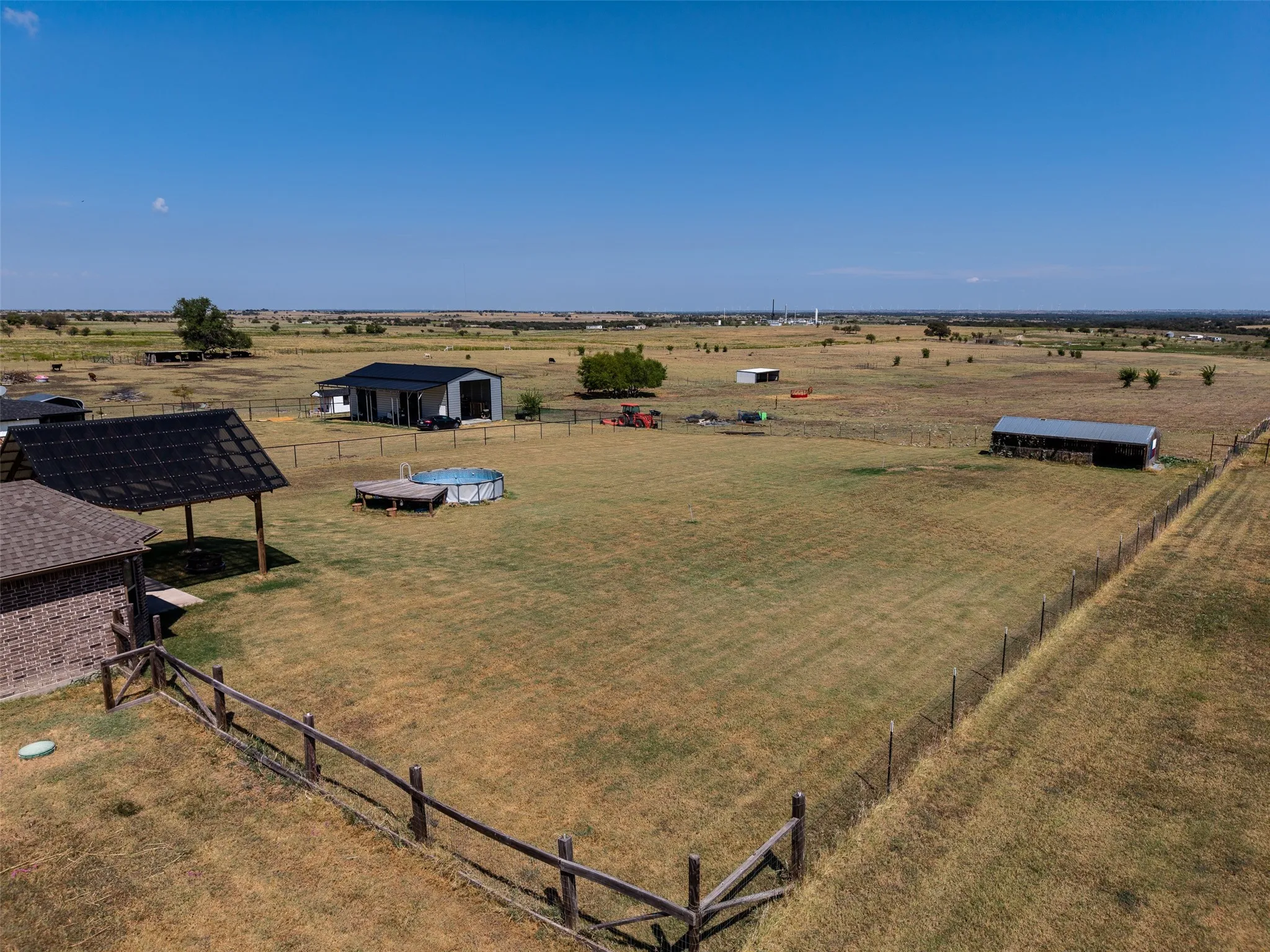 A view of the rolling pasture land before you.