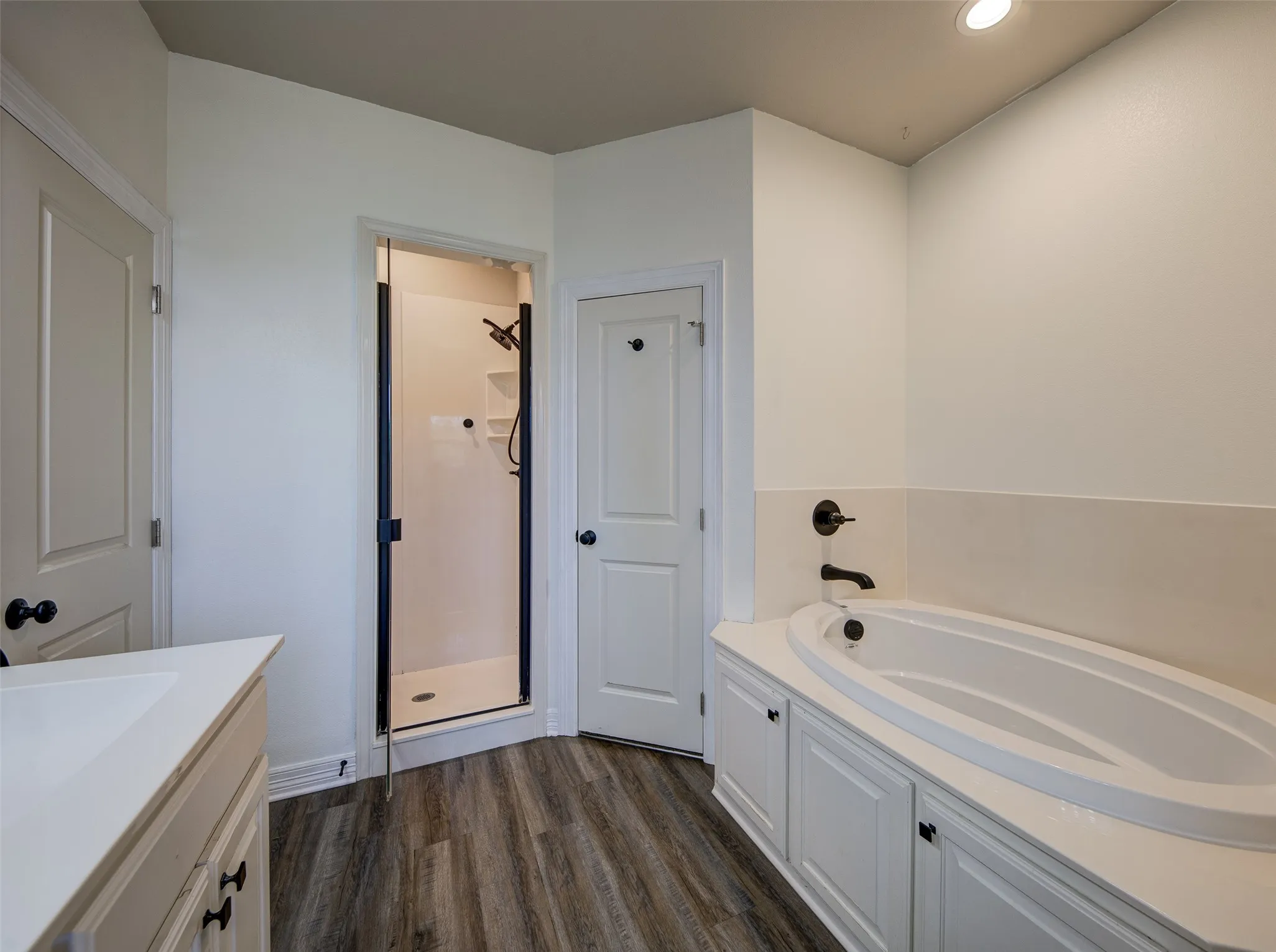 Primary bath with separate shower.