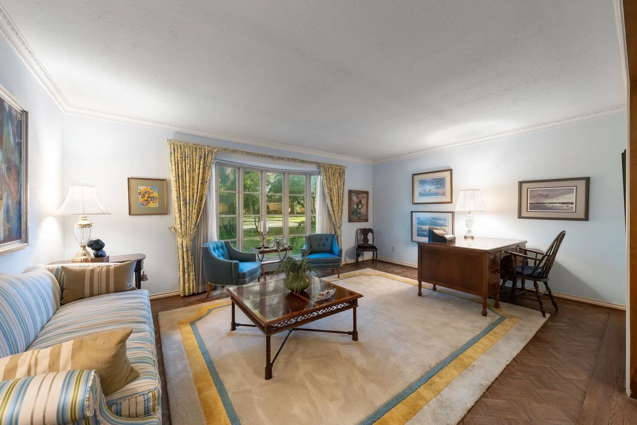 Living Room with wood floors and bay window.