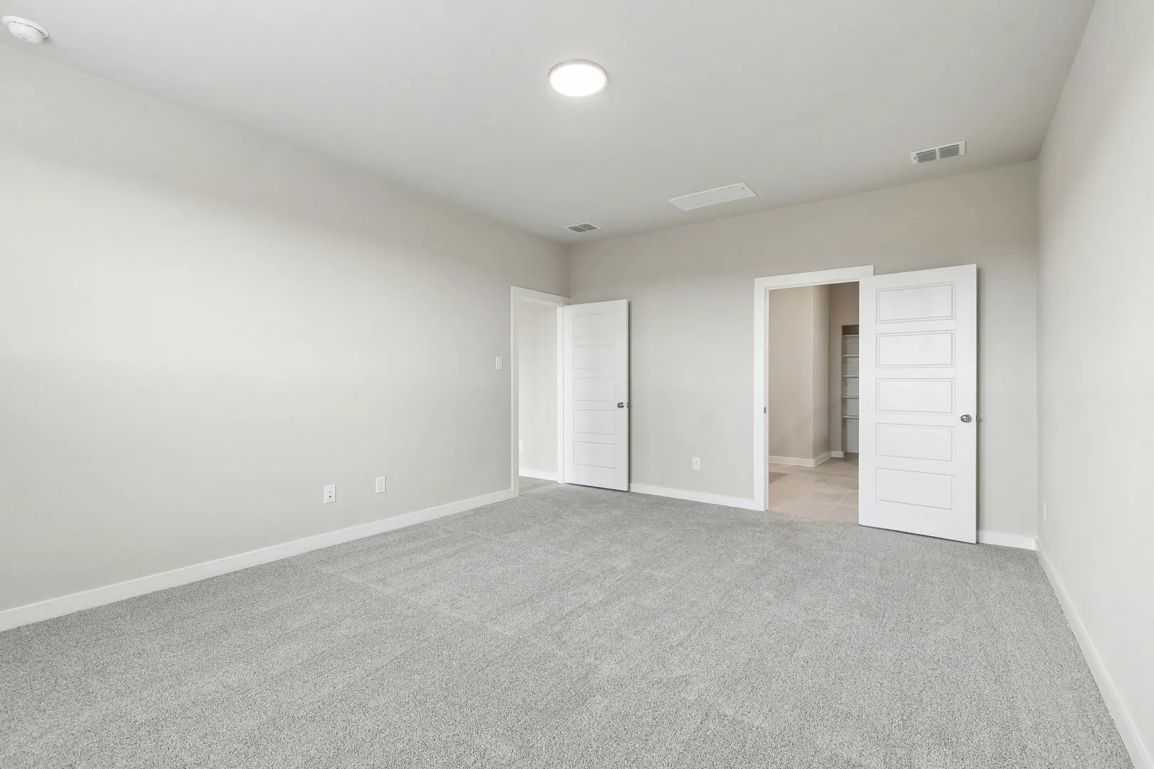 Primary Suite in the Winters home plan by Trophy Signature Homes – REPRESENTATIVE PHOTO