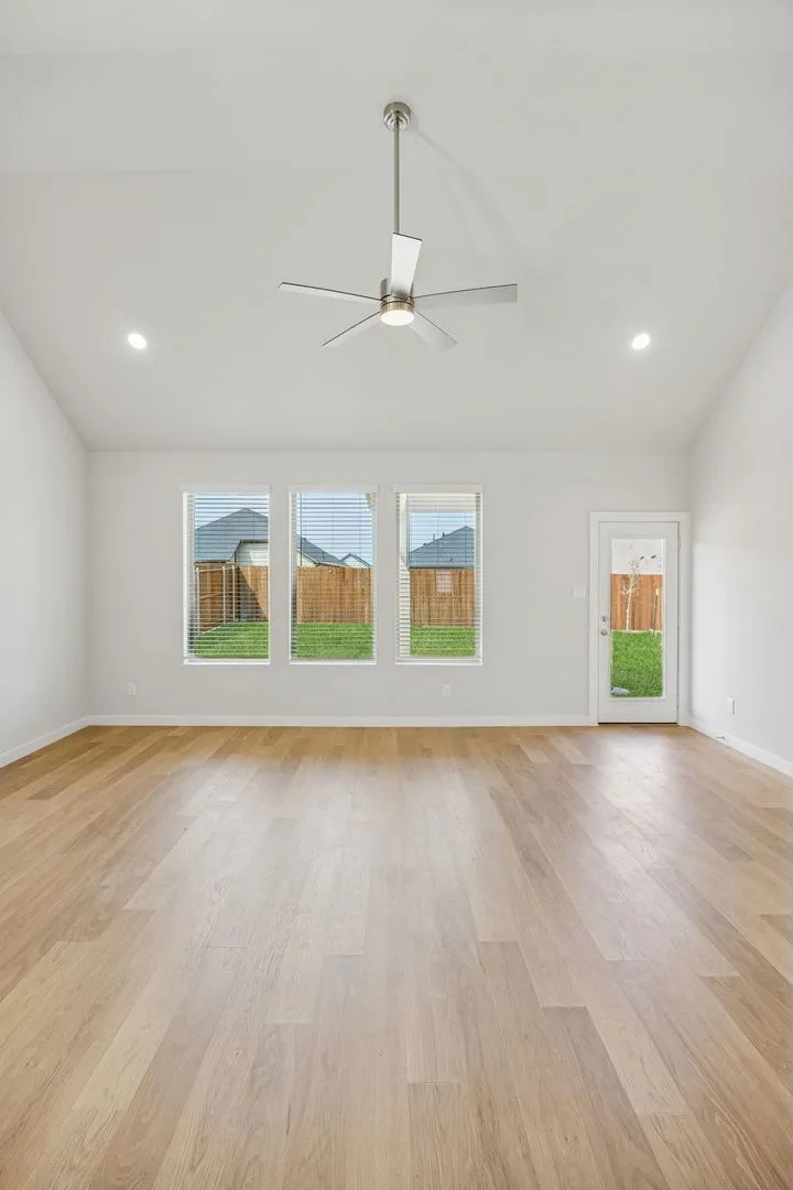 Living Room in the Stanley II home plan by Trophy Signature Homes – REPRESENTATIVE PHOTO