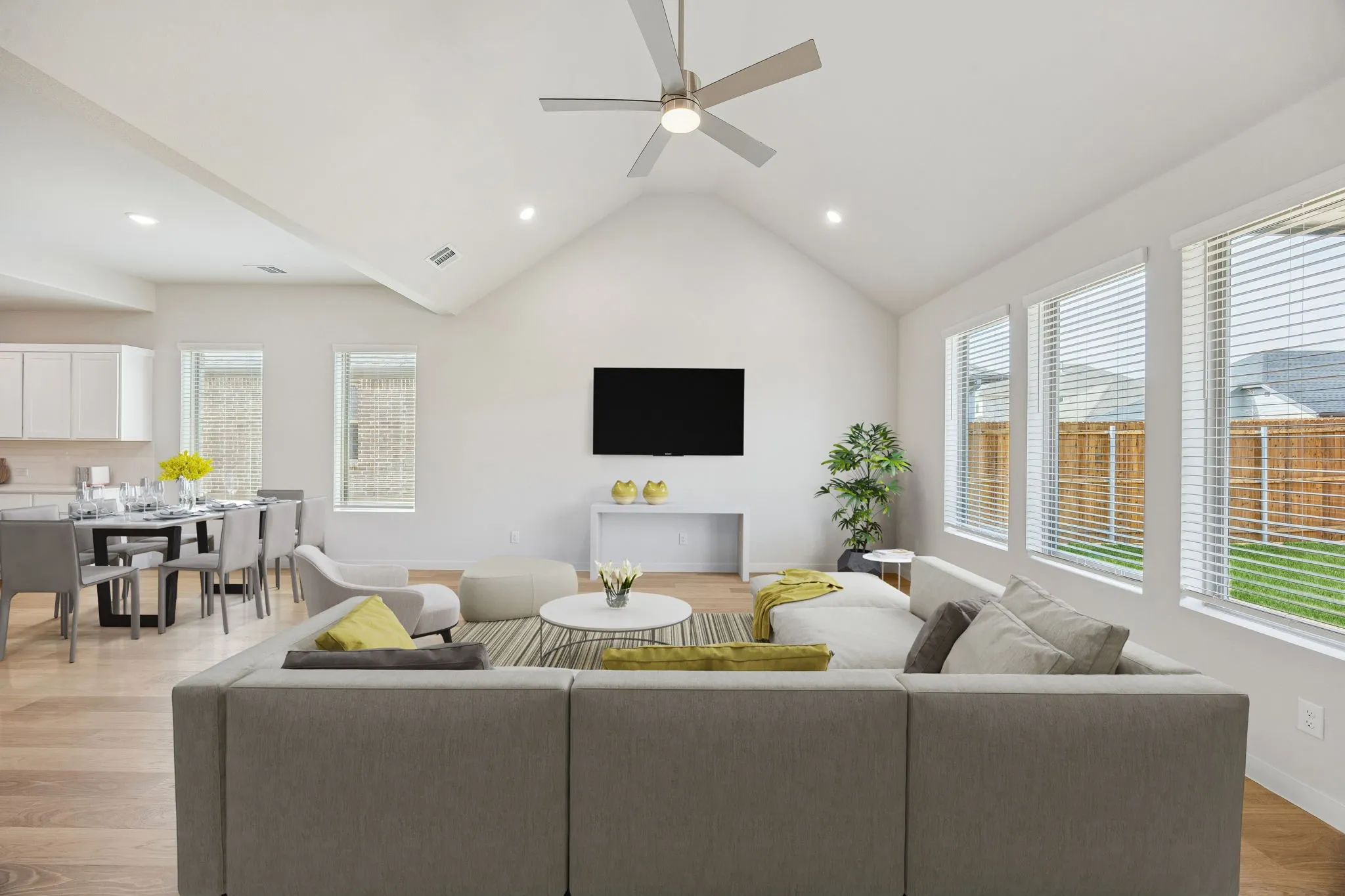 Living and Dining Room in the Stanley II home plan by Trophy Signature Homes – REPRESENTATIVE PHO