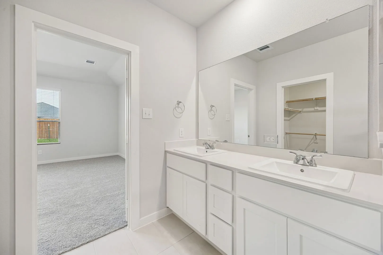 Primary Bathroom in the Stanley II home plan by Trophy Signature Homes – REPRESENTATIVE PHOTO