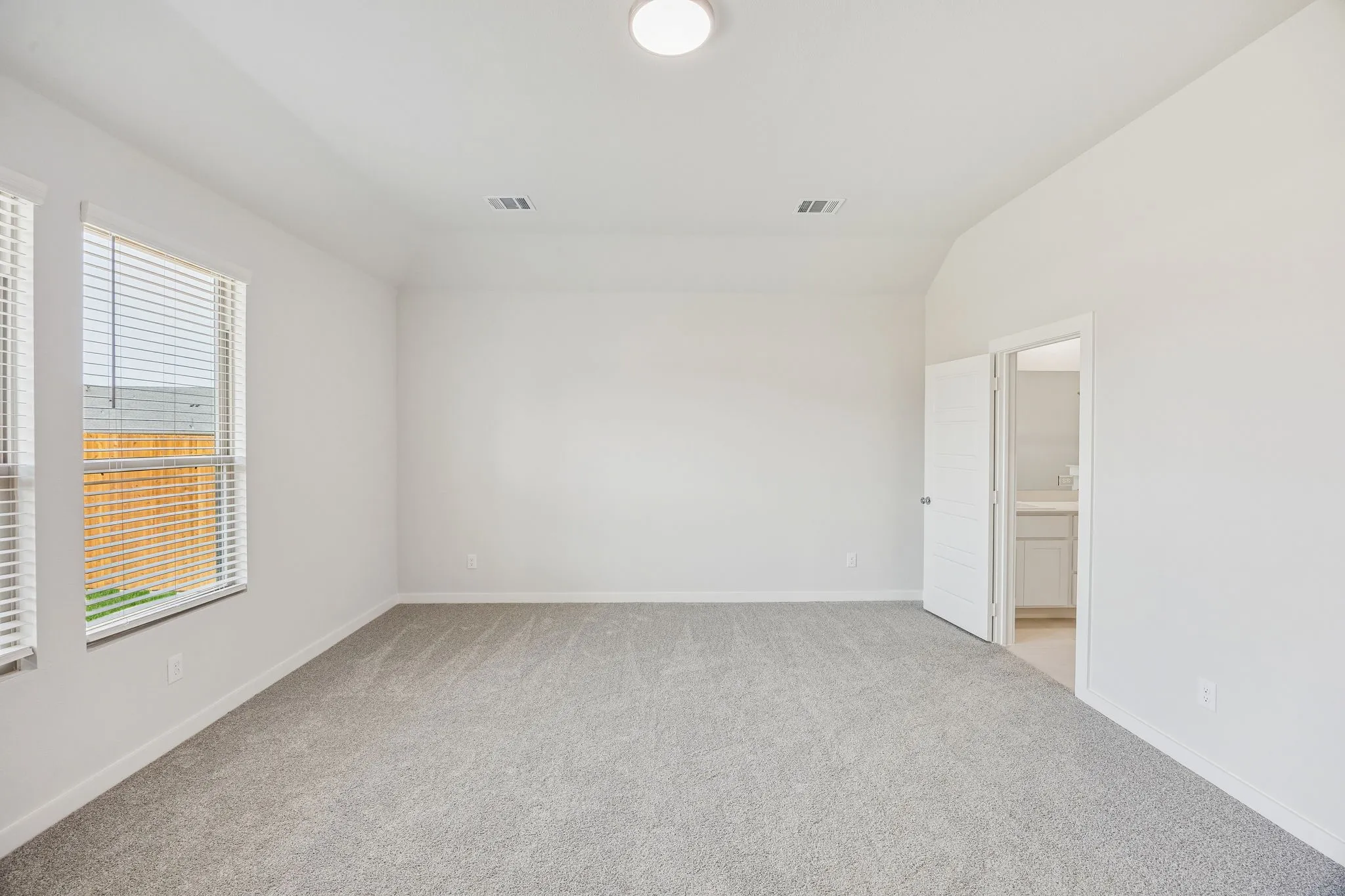 Primary Suite in the Stanley II home plan by Trophy Signature Homes – REPRESENTATIVE PHOTO