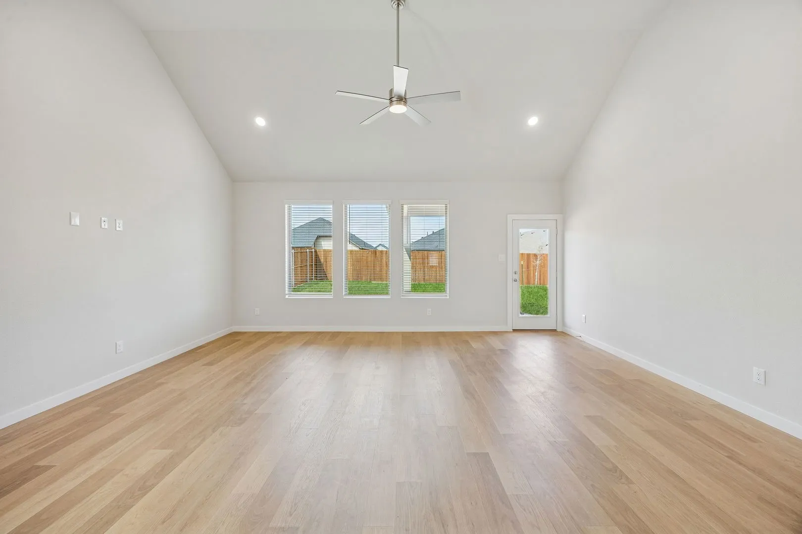 Living and Dining Room in the Stanley II home plan by Trophy Signature Homes – REPRESENTATIVE PHO