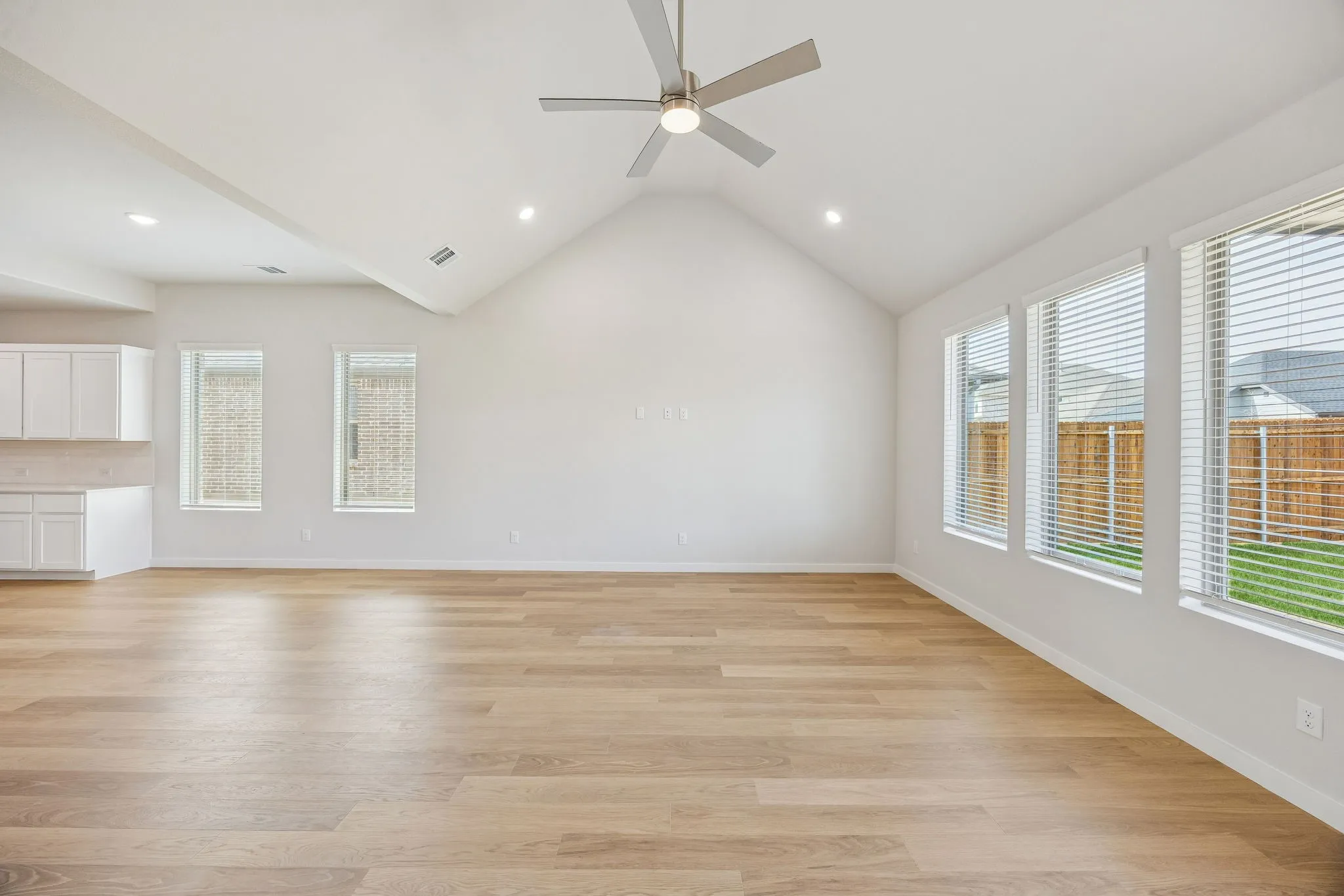 Living and Dining Room in the Stanley II home plan by Trophy Signature Homes – REPRESENTATIVE PHO