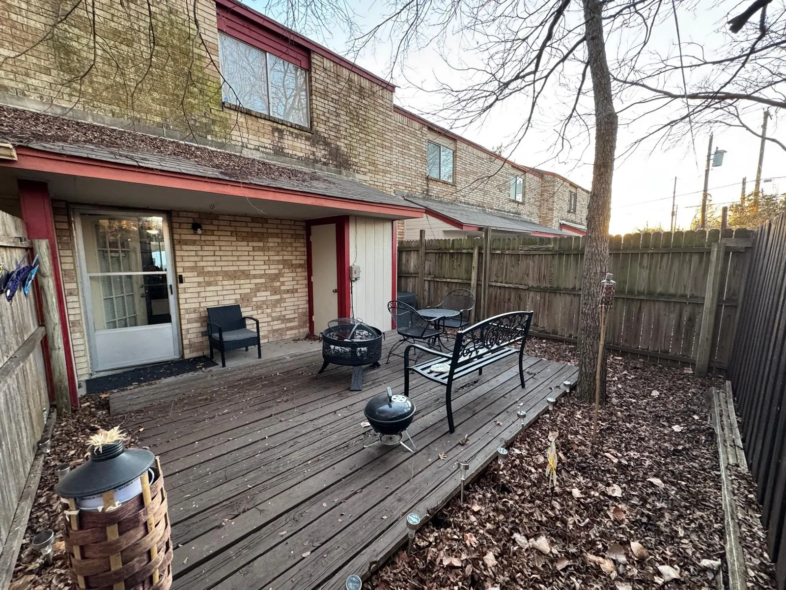 Private wooden deck with perimeter fencing