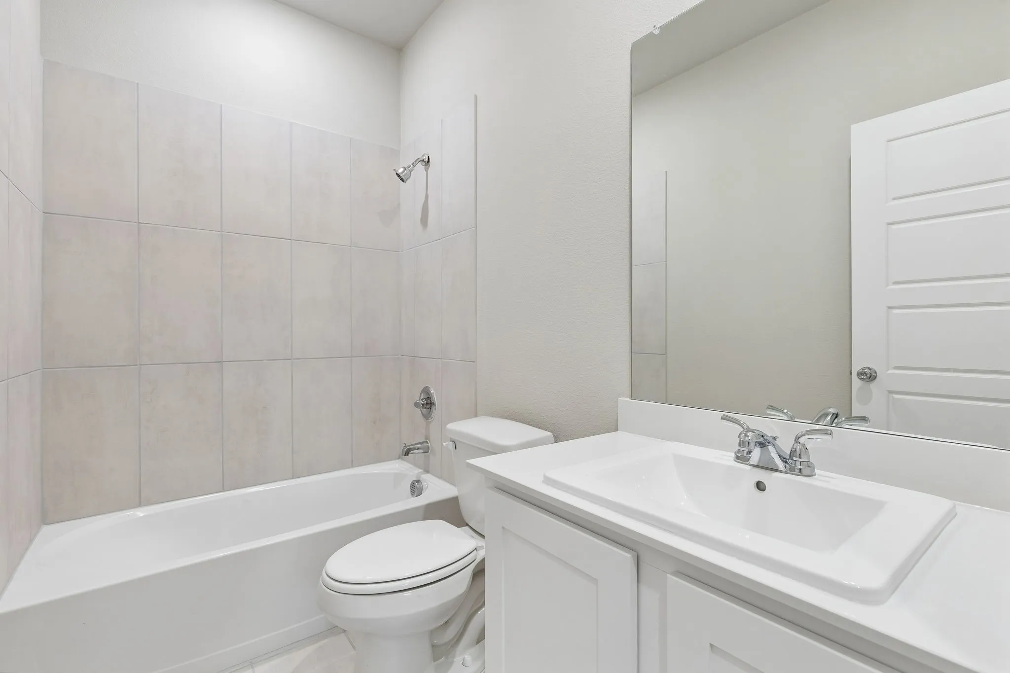 Bathroom in the Emmy II home plan by Trophy Signature Homes - REPRESENTATIVE PHOTO