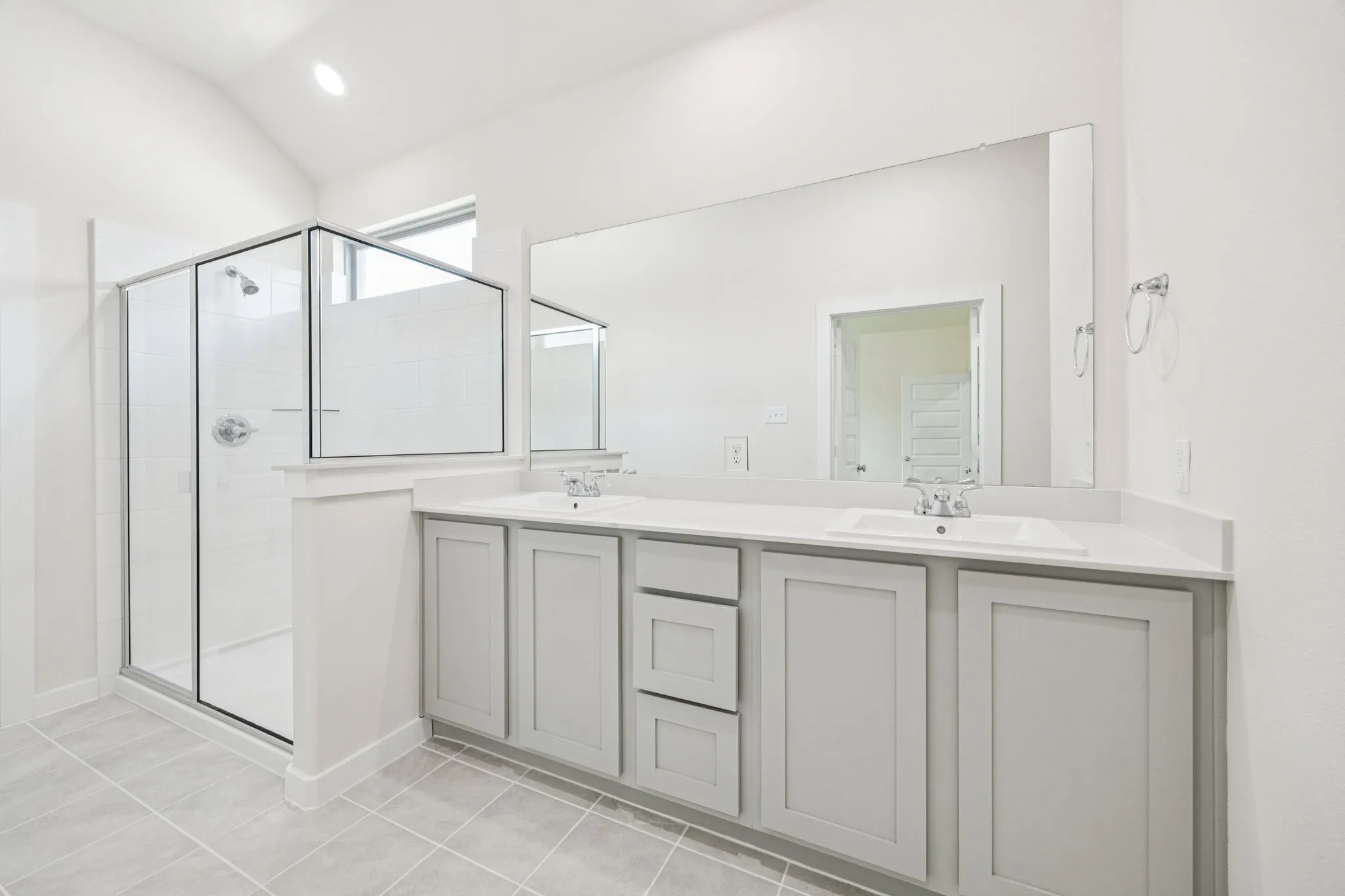 Primary Bathroom in the Claret home plan by Trophy Signature Homes – REPRESENTATIVE PHOTO