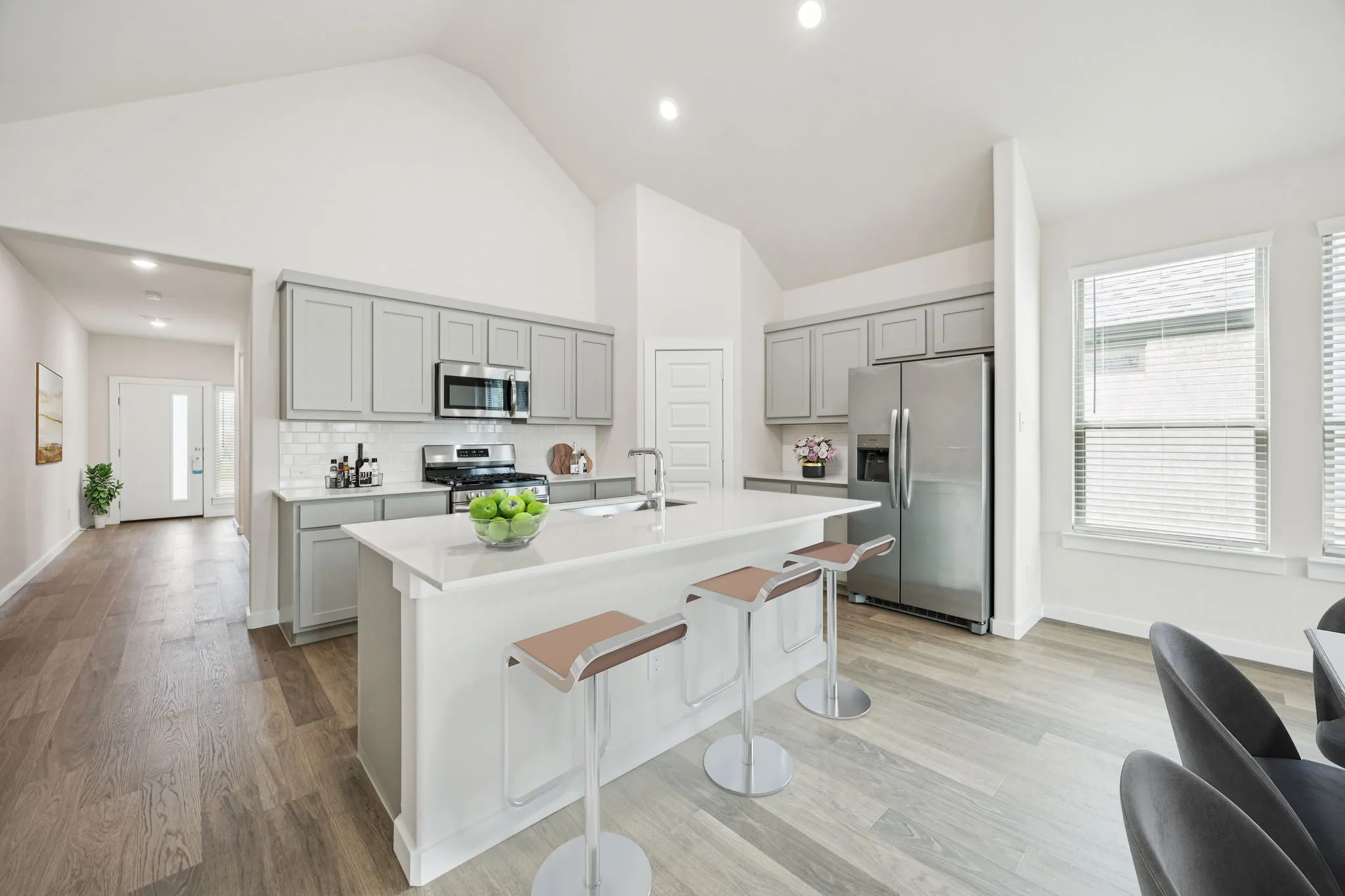 Kitchen in the Claret home plan by Trophy Signature Homes – REPRESENTATIVE PHOTO
