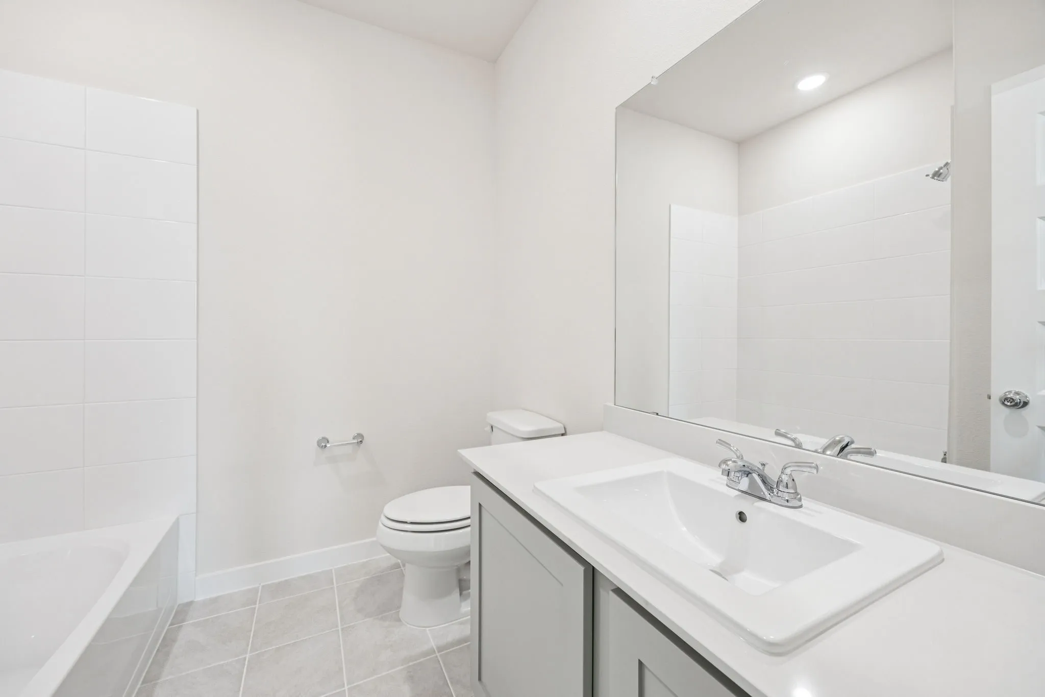 Bathroom in the Claret home plan by Trophy Signature Homes – REPRESENTATIVE PHOTO
