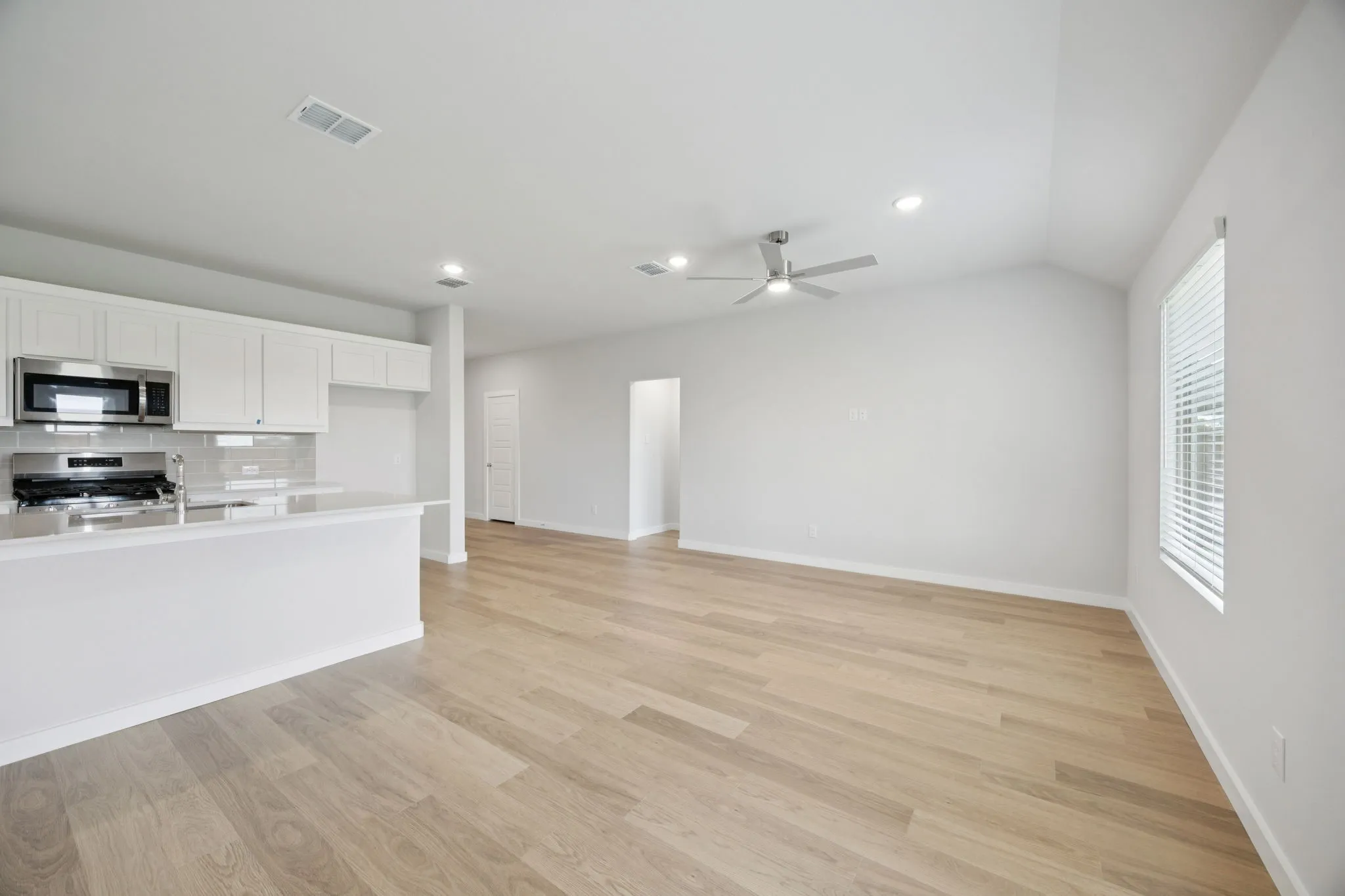 Living Room in the Hadley home plan by Trophy Signature Homes – REPRESENTATIVE PHOTO