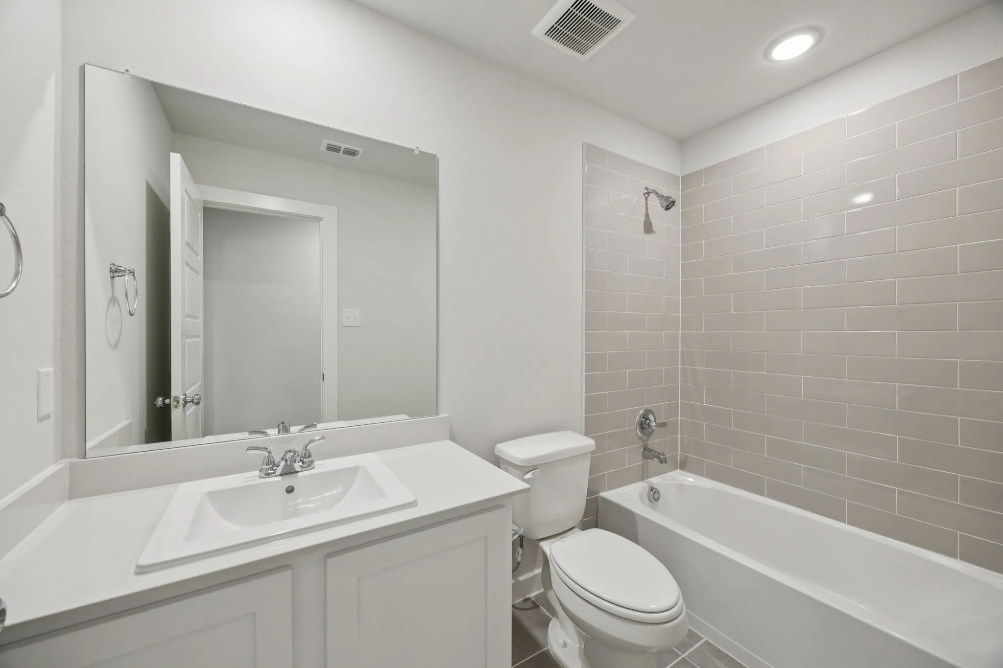 Bathroom in the Hadley home plan by Trophy Signature Homes – REPRESENTATIVE PHOTO