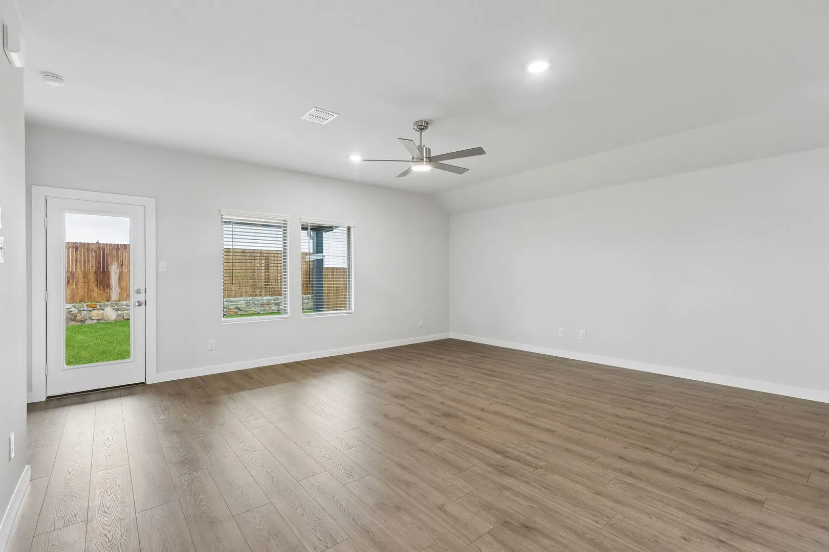 Living Room in the Oscar home plan by Trophy Signature Homes – REPRESENTATIVE PHOTO