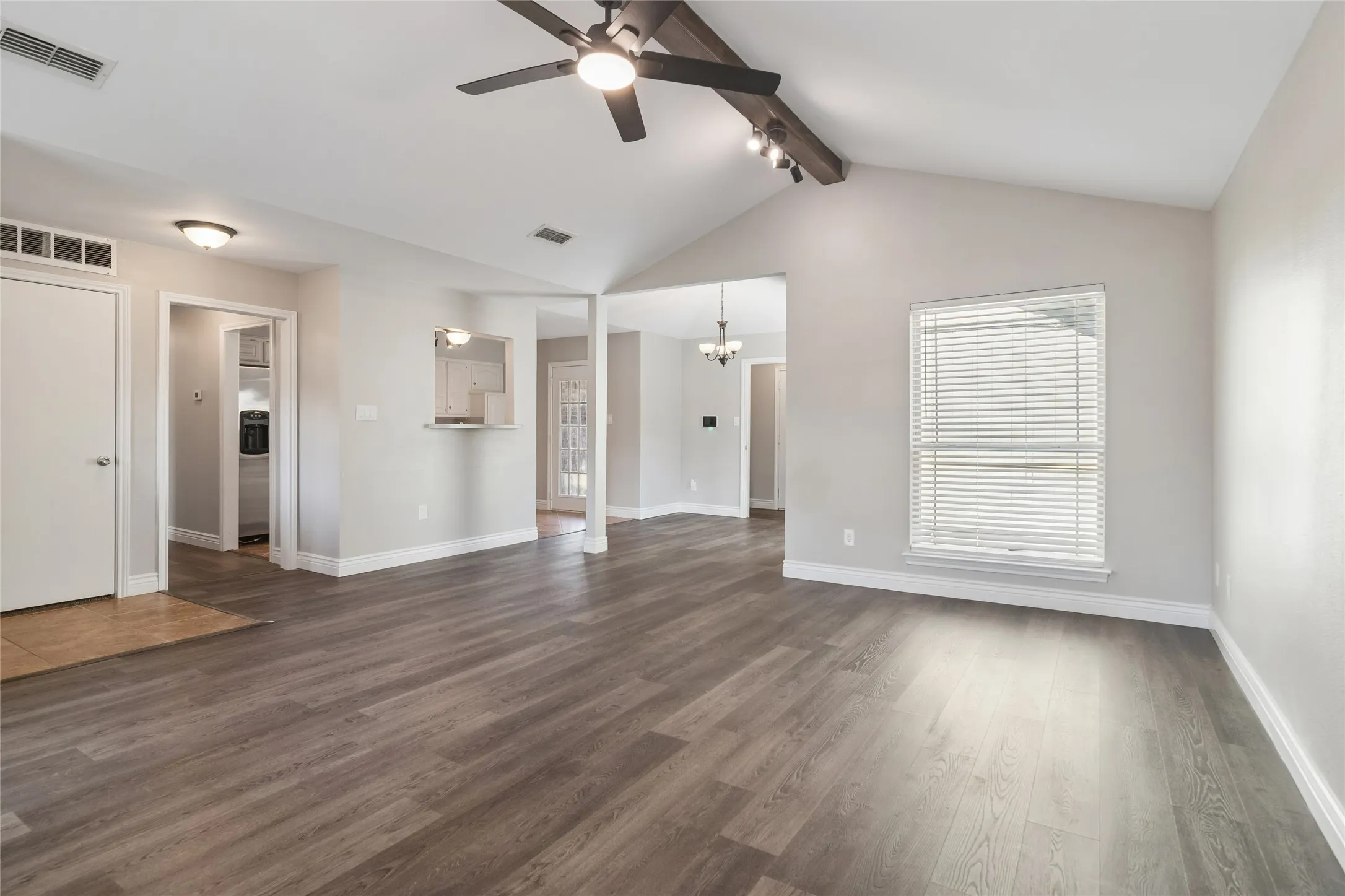 Open living and dining,
Wood Beam