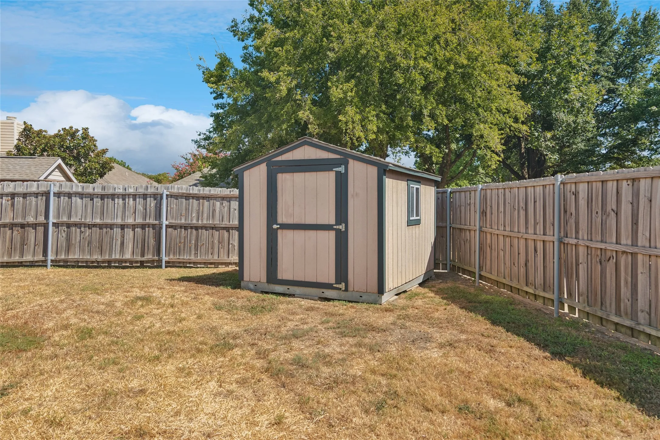 Large yard with shed