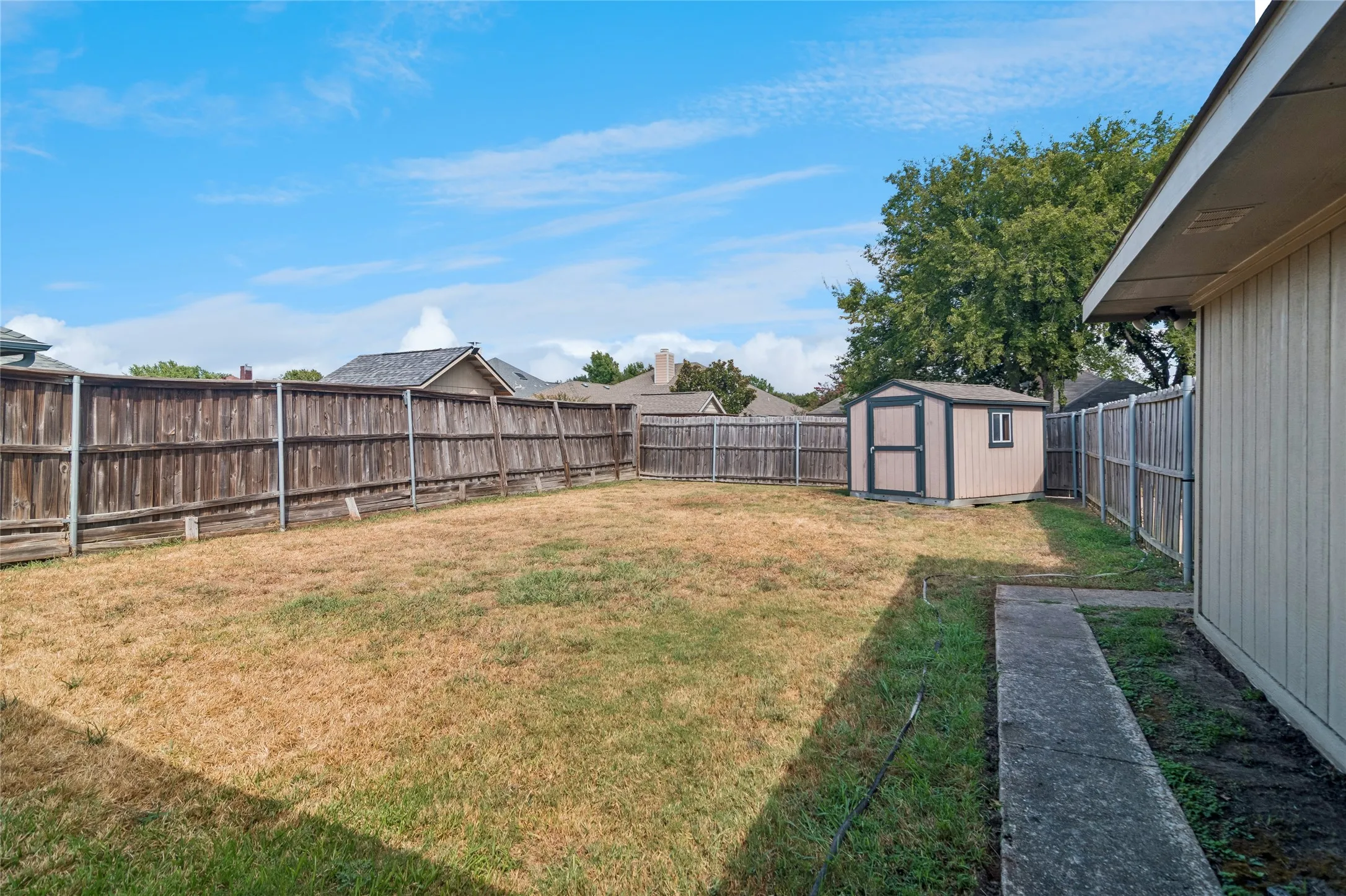 Large yard with shed