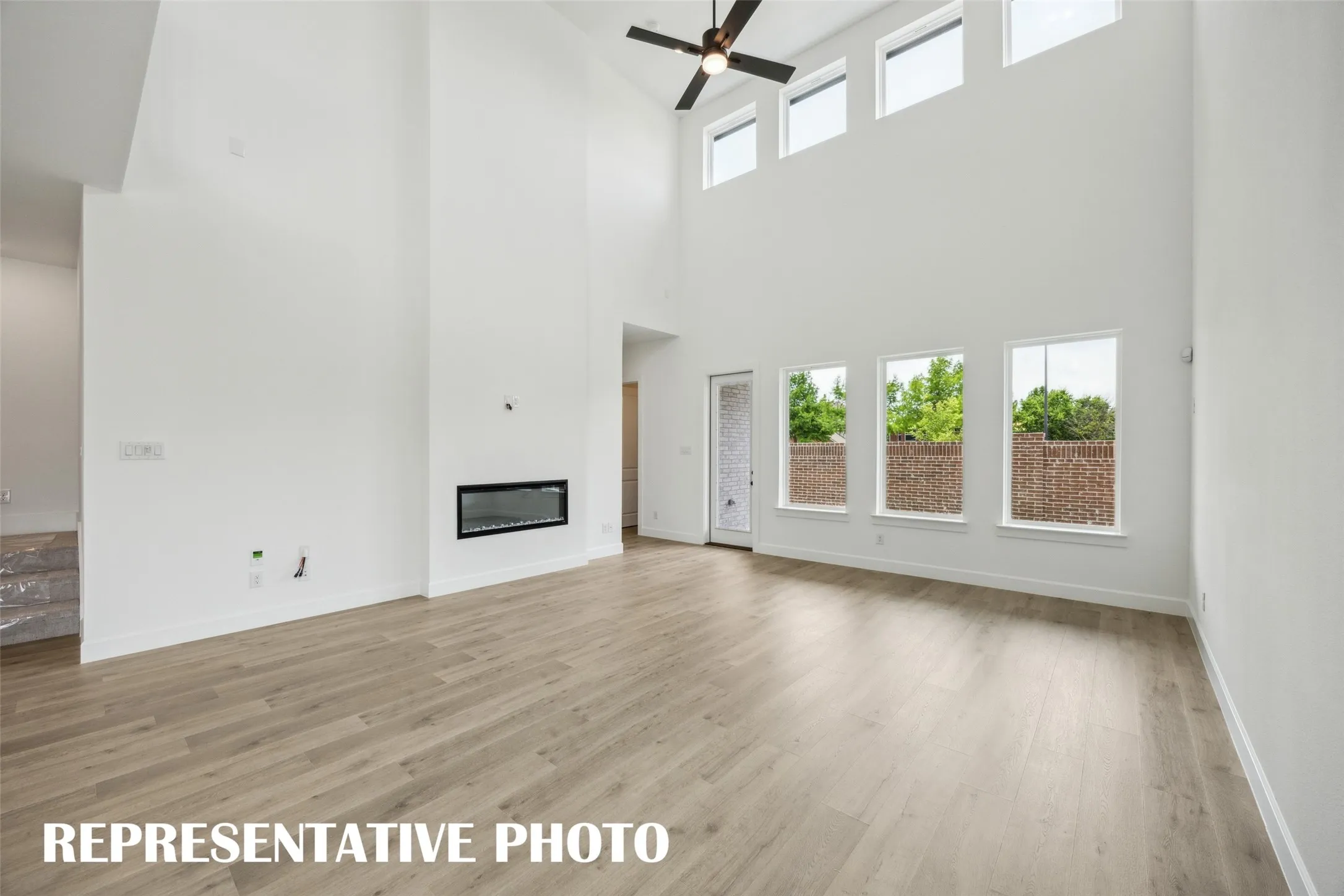 Plenty of space to host family and friends in this outstanding family room! REPRESENTATIVE PHOTO