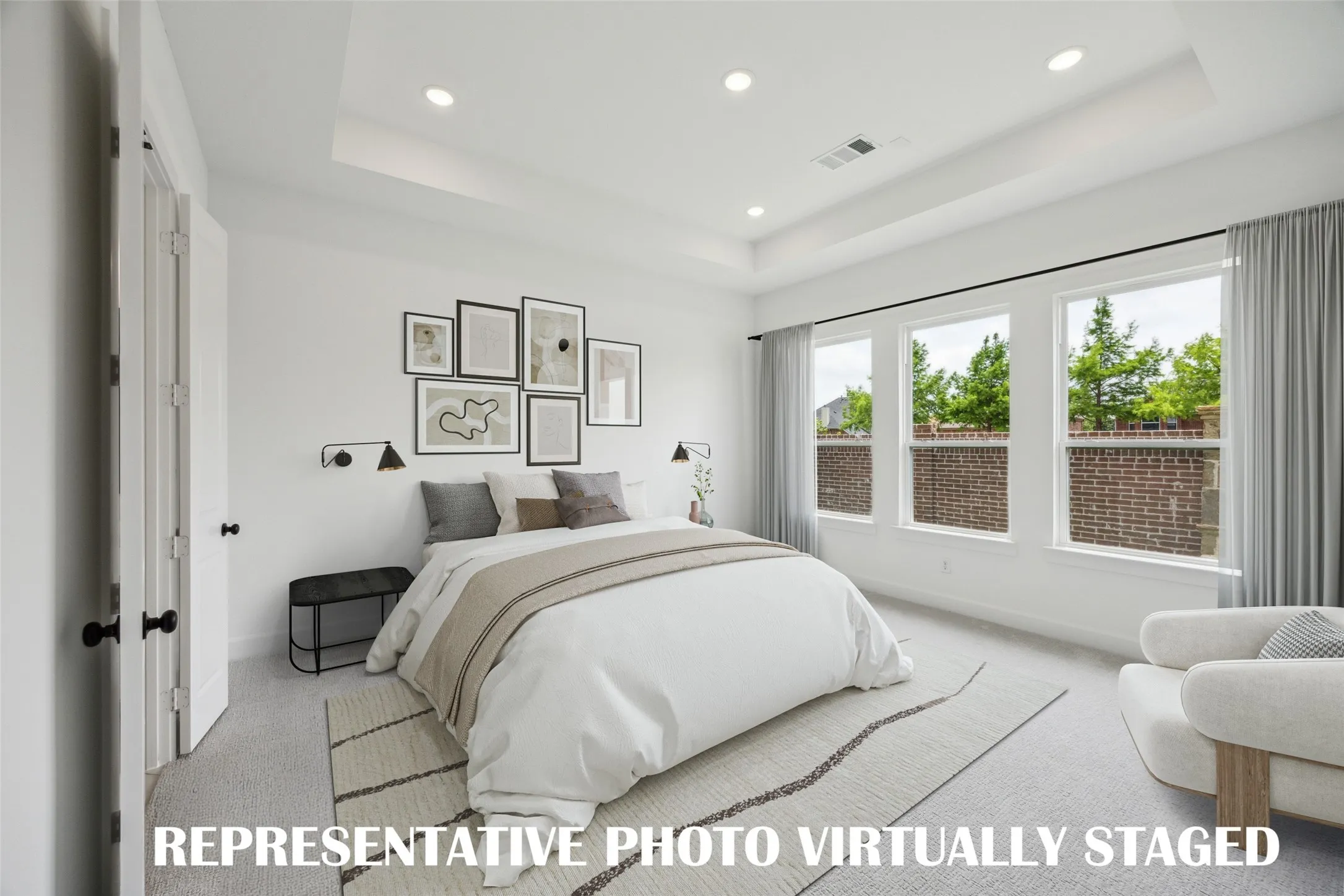 Located at the rear of the home for additional privacy, this owner's suite was designed for rest and relaxation. REPRESENTATIVE PHOTO VIRTUALLY STAGED