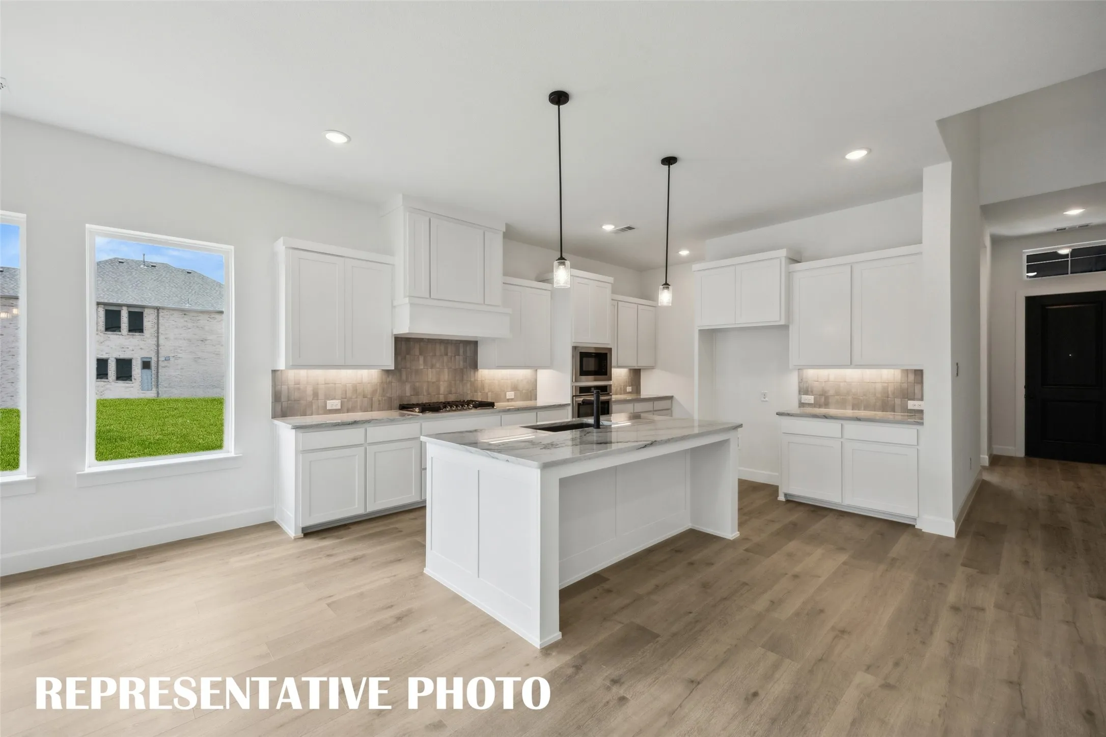 Our Royale plan pairs beautiful finishes with functional design to create your dream kitchen! REPRESENTATIVE PHOTO
