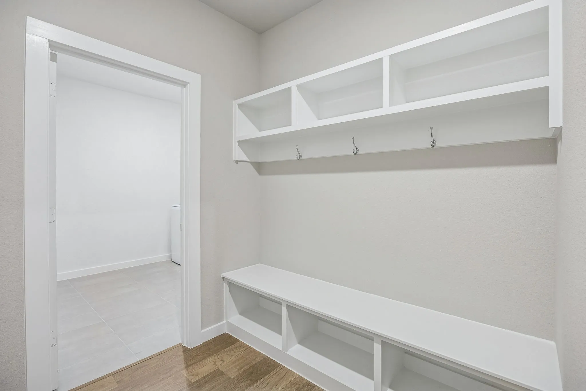 Utility Room in the Wimbledon home plan by Trophy Signature Homes – REPRESENTATIVE PHOTO