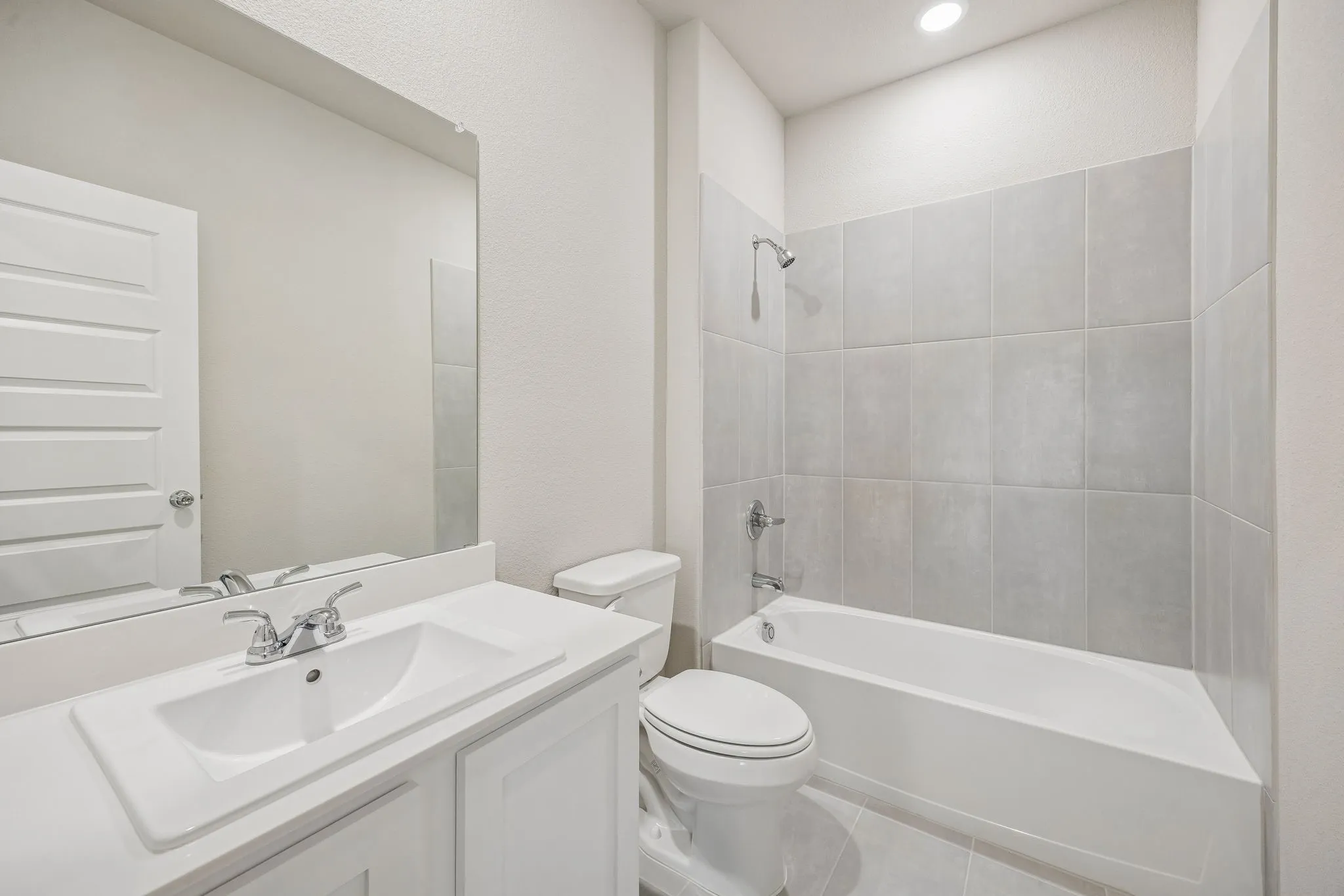 Bathroom in the Wimbledon home plan by Trophy Signature Homes – REPRESENTATIVE PHOTO