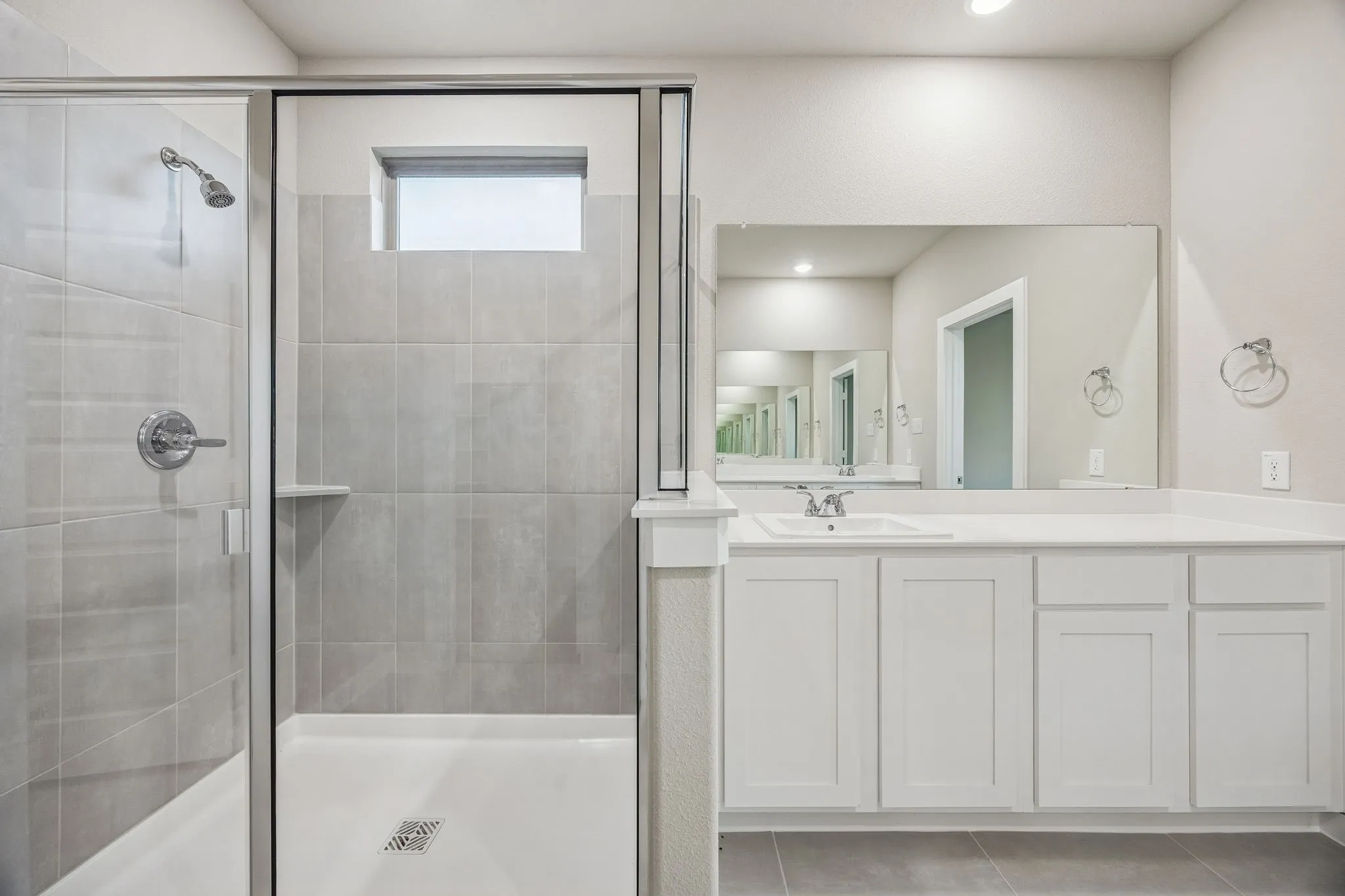 Primary Bathroom in the Wimbledon home plan by Trophy Signature Homes – REPRESENTATIVE PHOTO