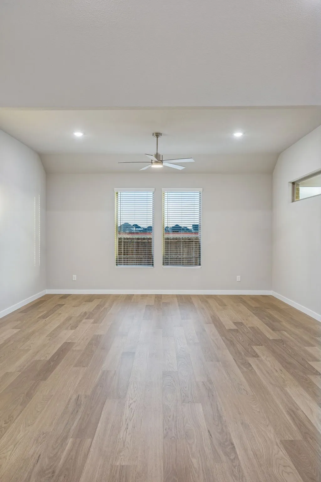 Living Room in the Wimbledon home plan by Trophy Signature Homes – REPRESENTATIVE PHOTO
