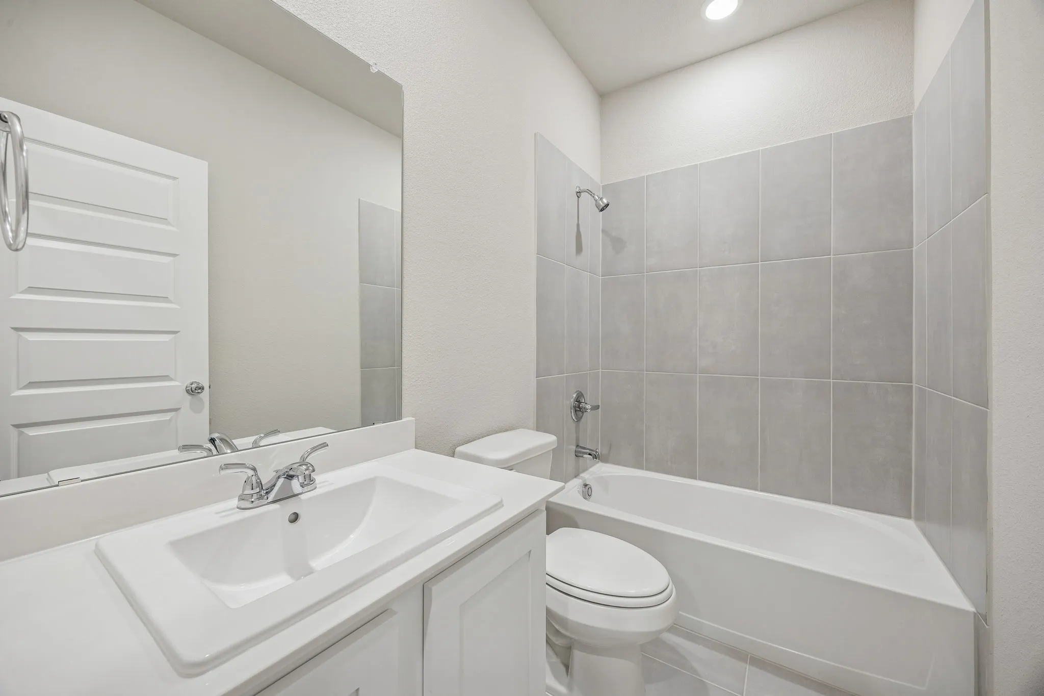 Bathroom in the Wimbledon home plan by Trophy Signature Homes – REPRESENTATIVE PHOTO