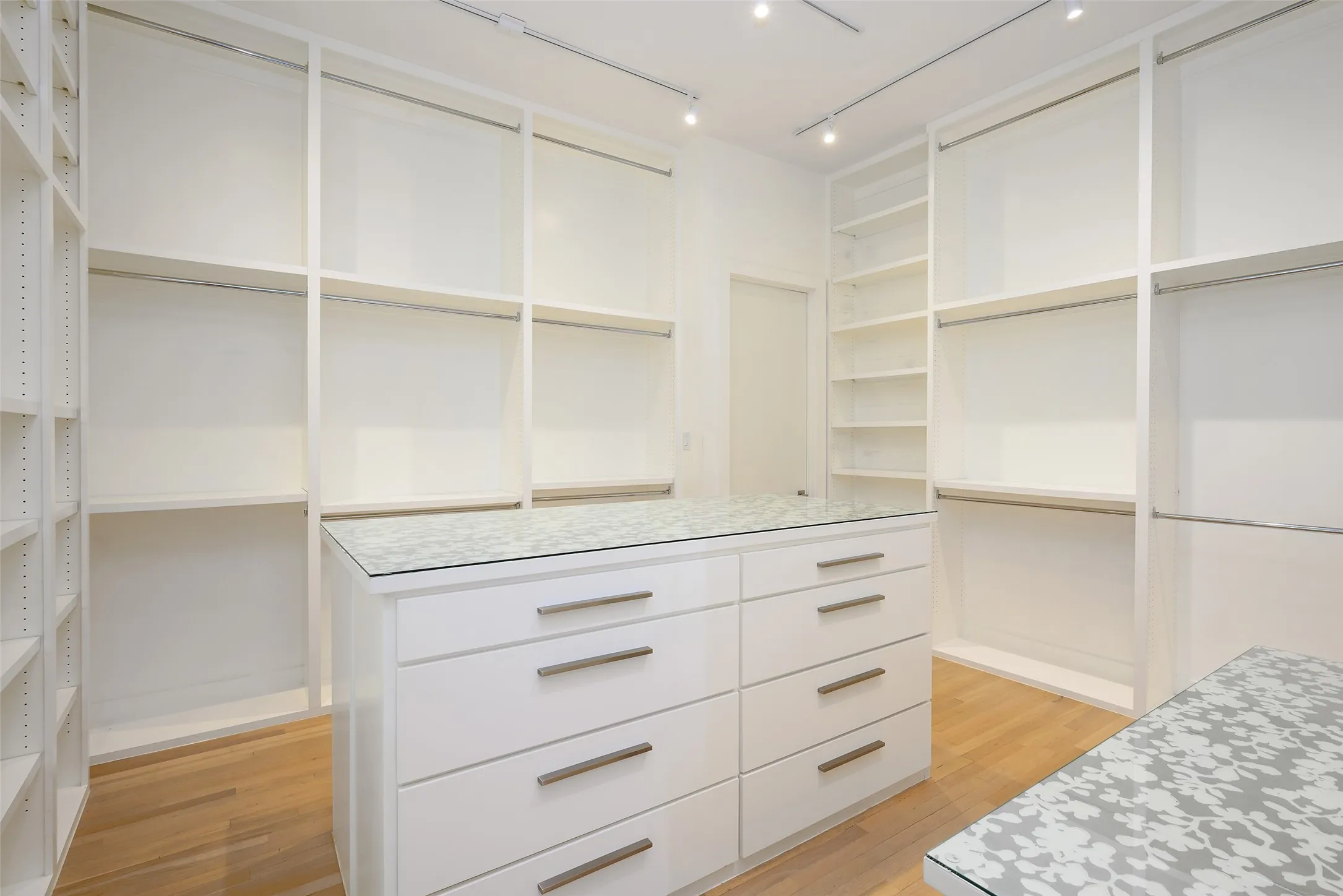 Primary Closet with access to the First Level Laundry Room