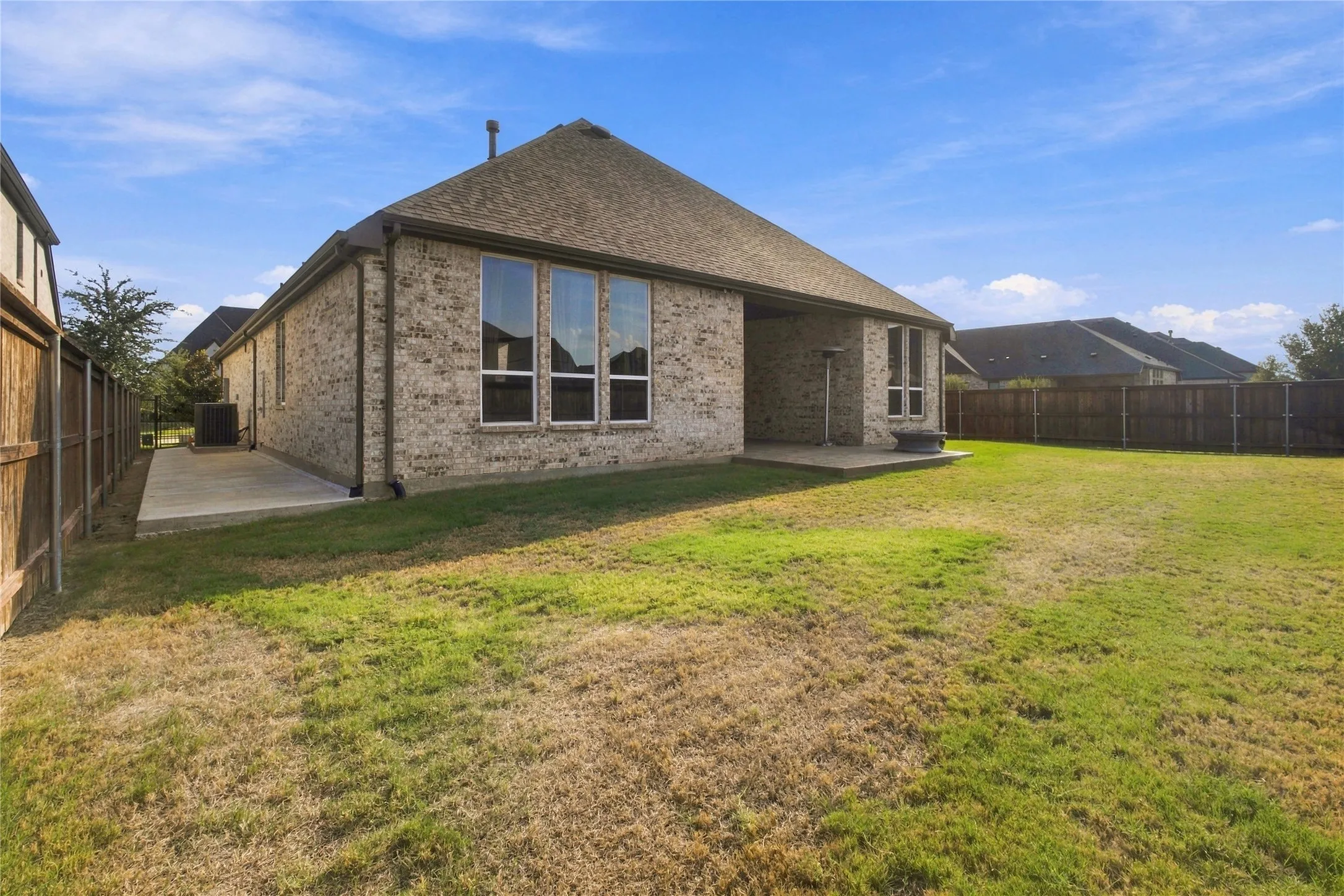 Brick exterior with multiple window configurations