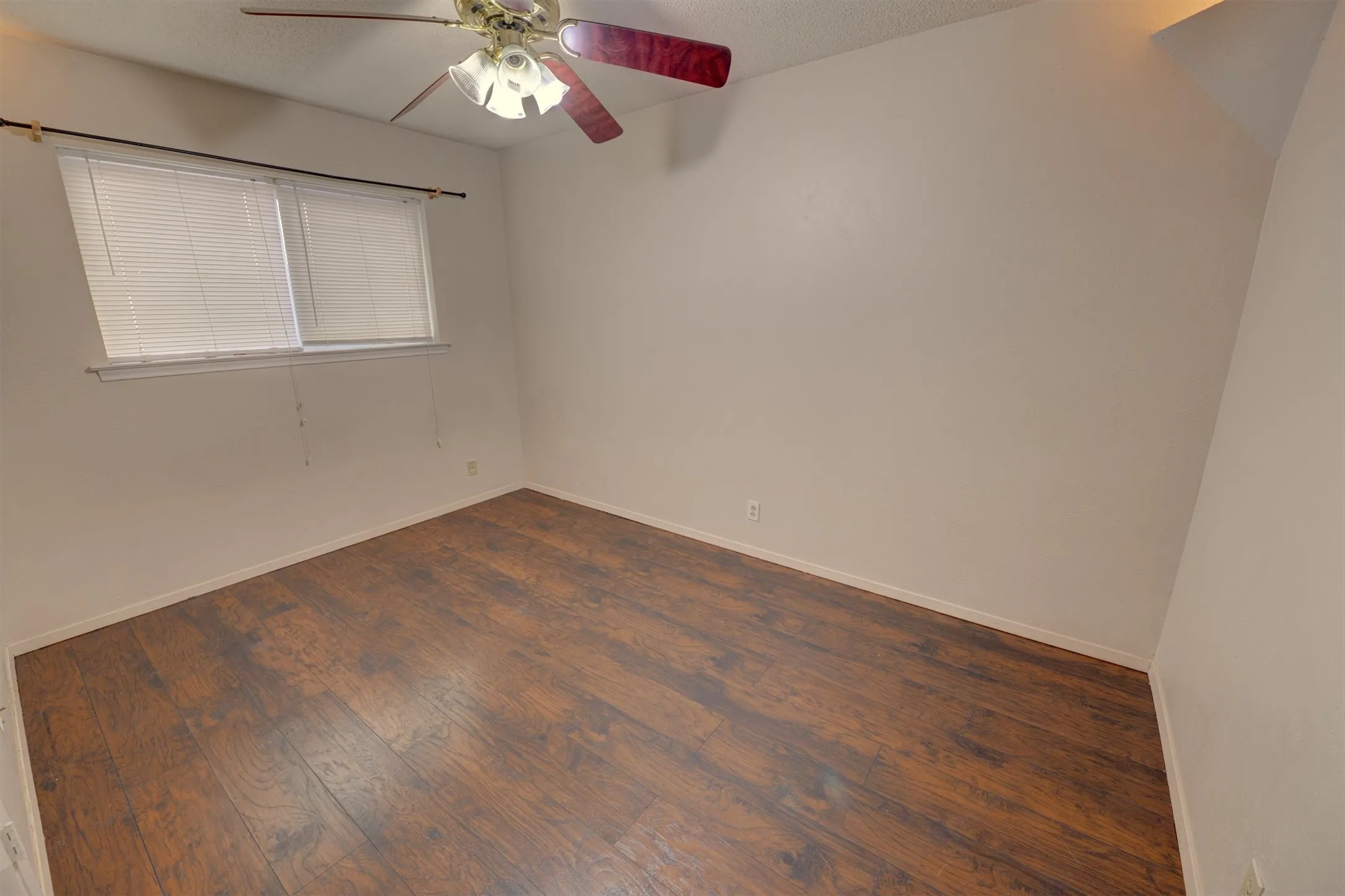 Wood-finish flooring with a neutral wall palette