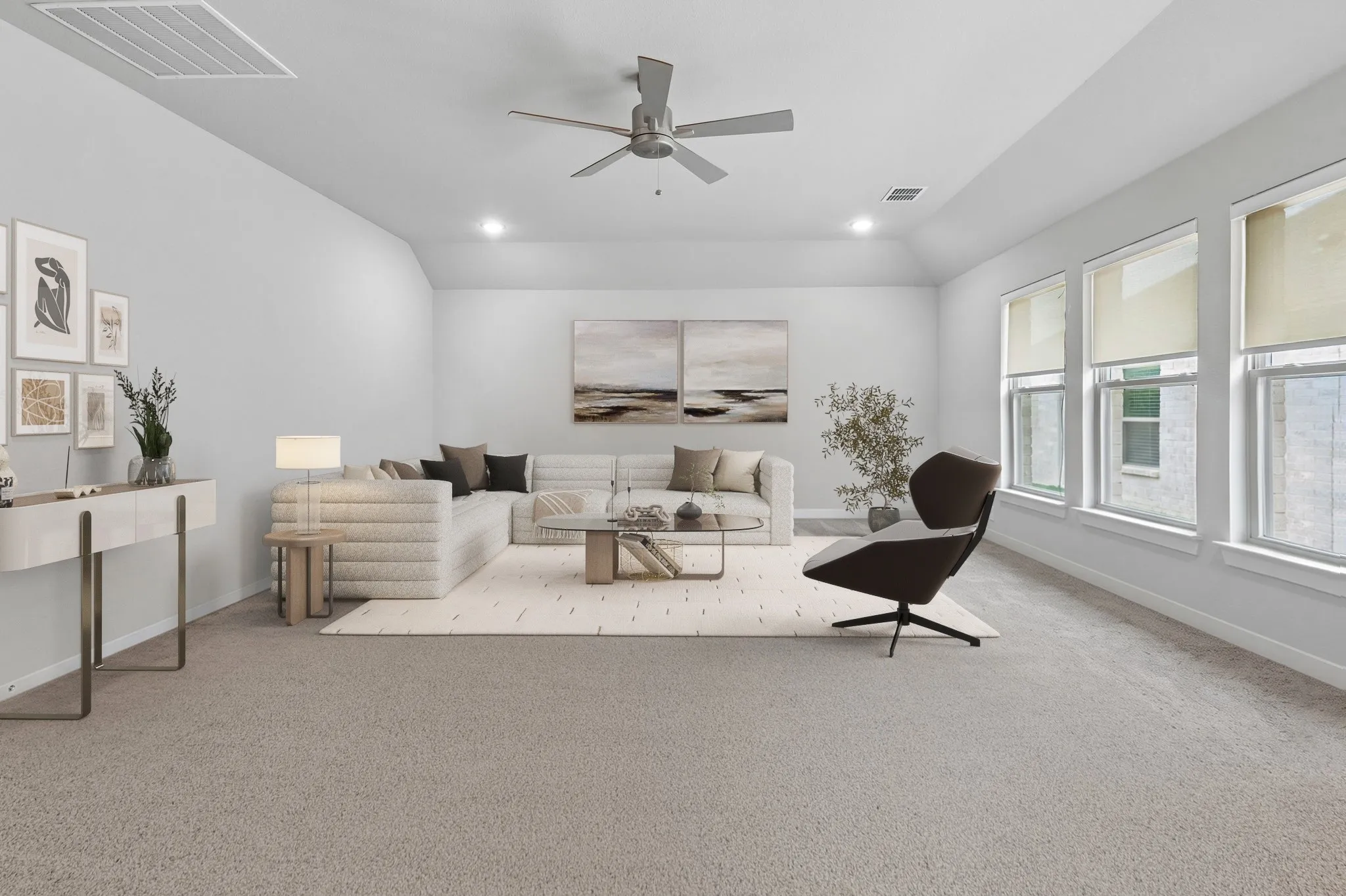 Light-colored carpeting, multiple windows with roller shades, recessed lighting, and a ceiling fan