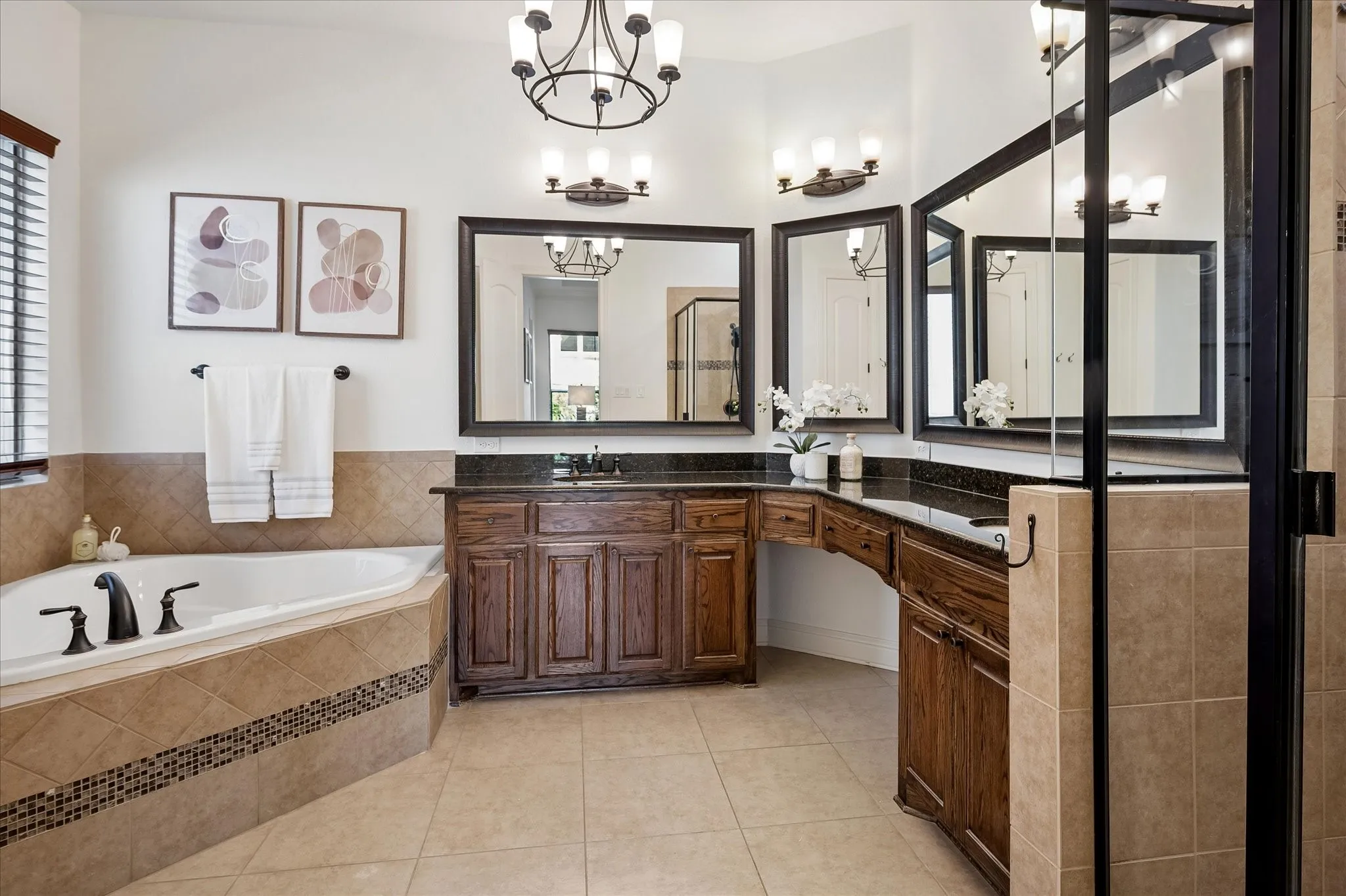 The primary has a private doored water closet, linen closet, separate shower and tub with dual sinks and great storage.