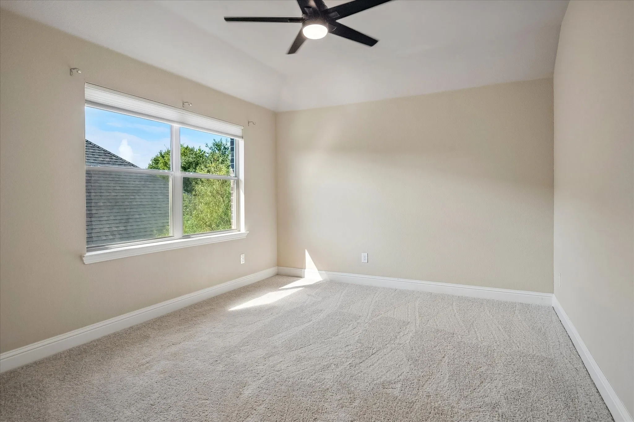 Upstairs spacious back bedroom with a great closet.