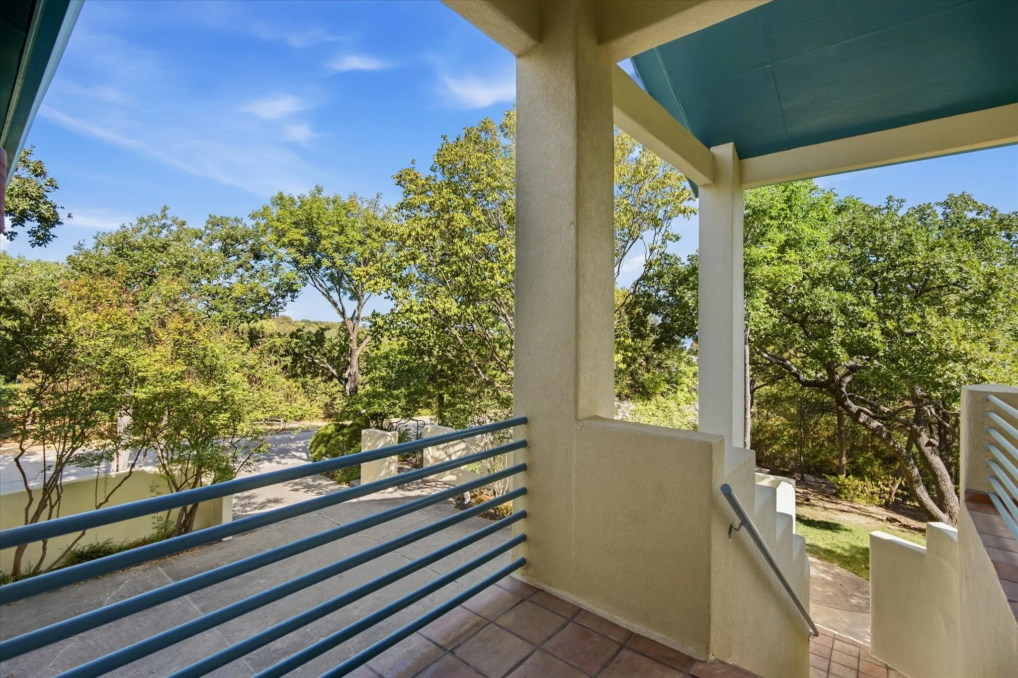 Secondary balcony. Heavily treed.
