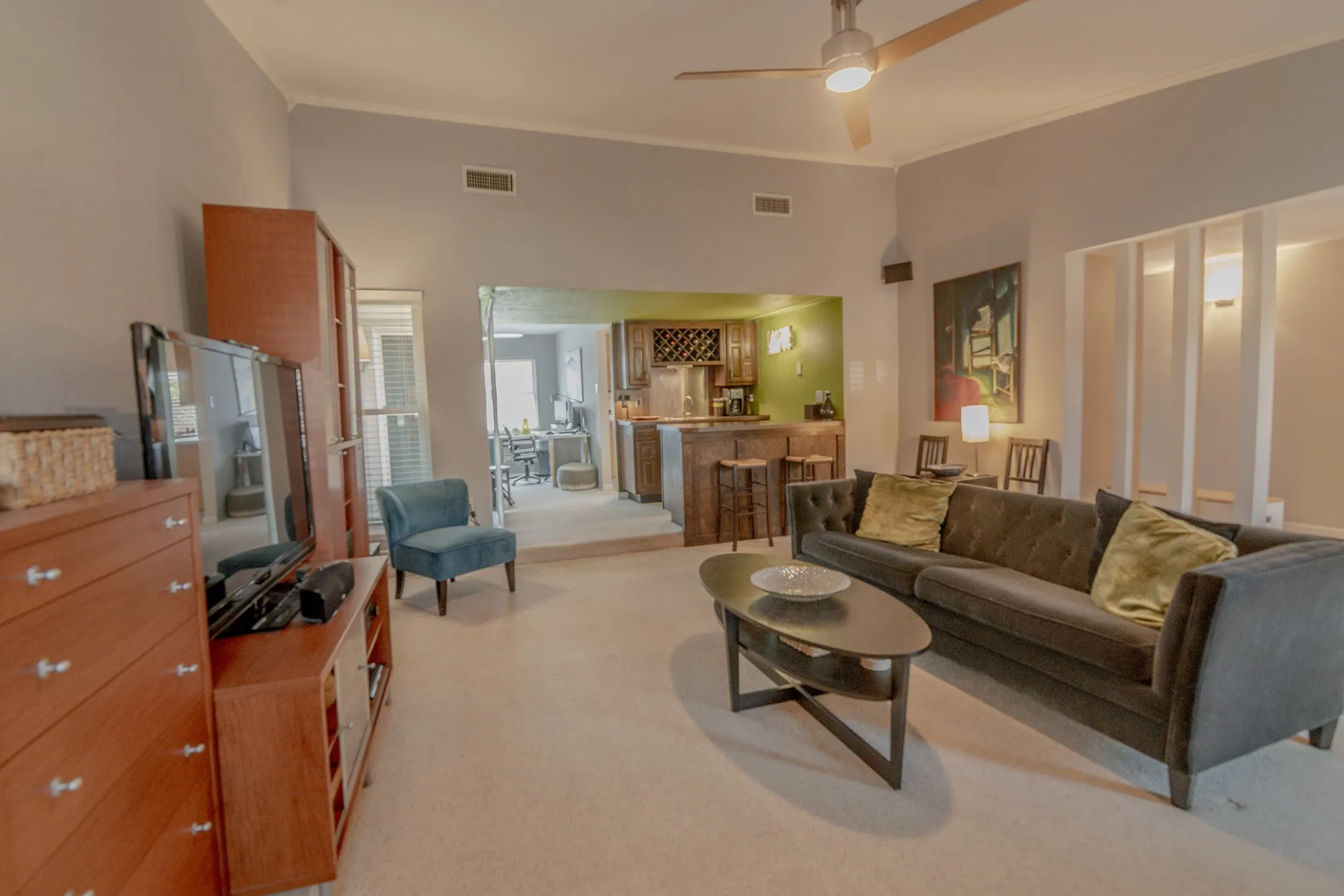 Vaulted ceilings with a ceiling fan, recessed lighting, and an open-concept layout